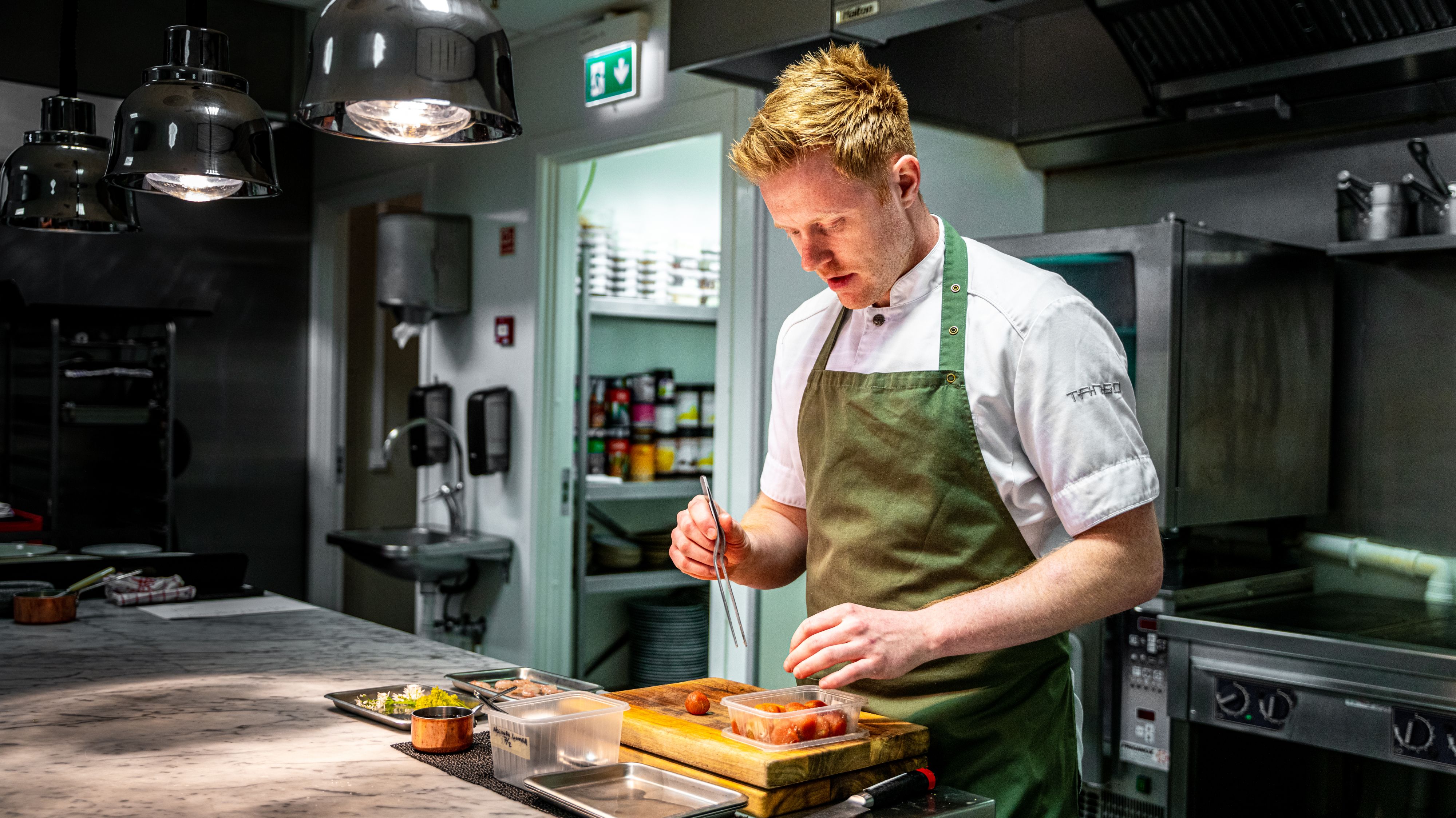 Head chef Jan-Erik Hauge prepping food at restaurant Tango in Stavanger, Fjord Norway.