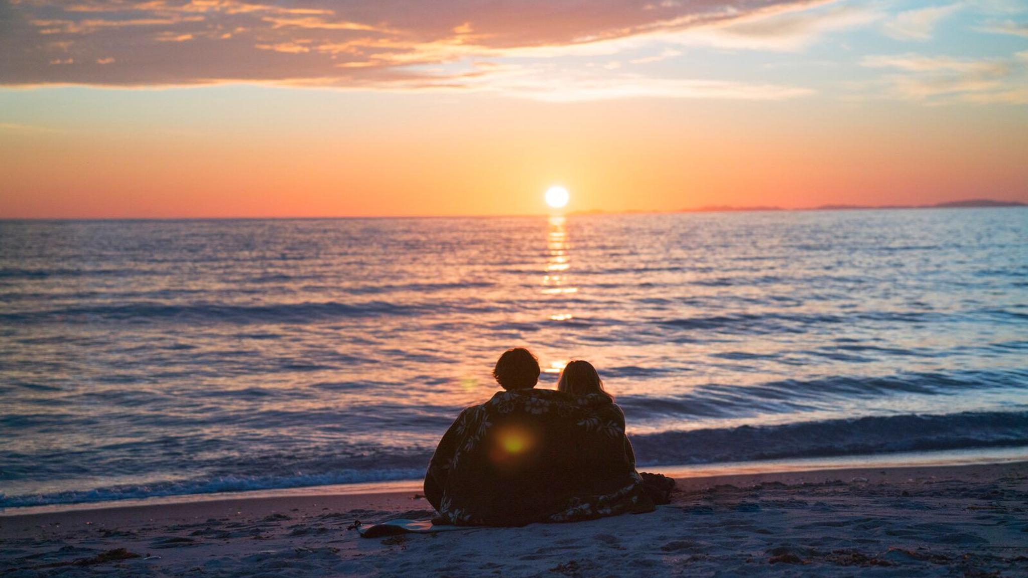 Midnight sun at Mjelle beach, Northern Norway