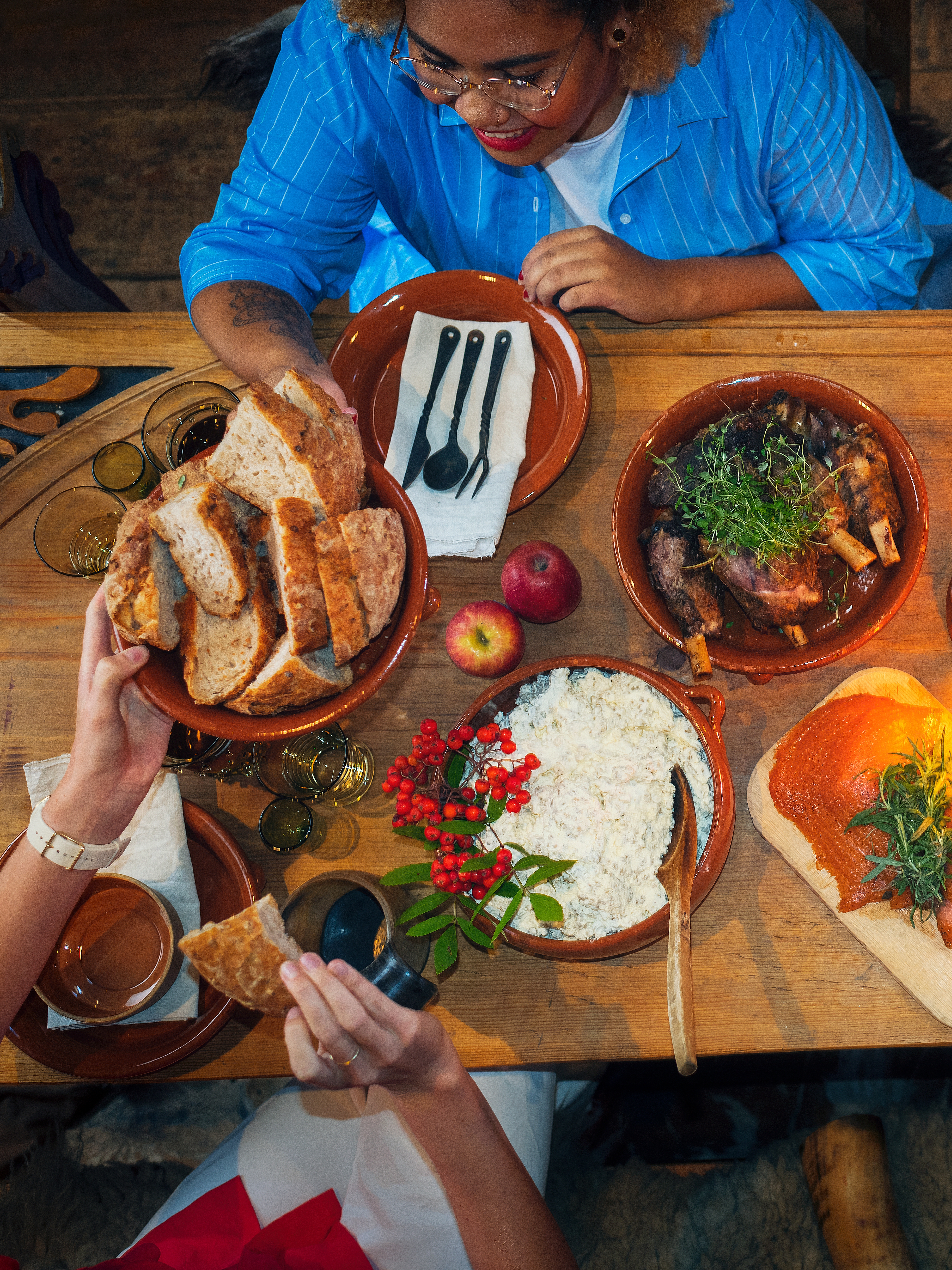 People enjoying local foods at Stiklestad