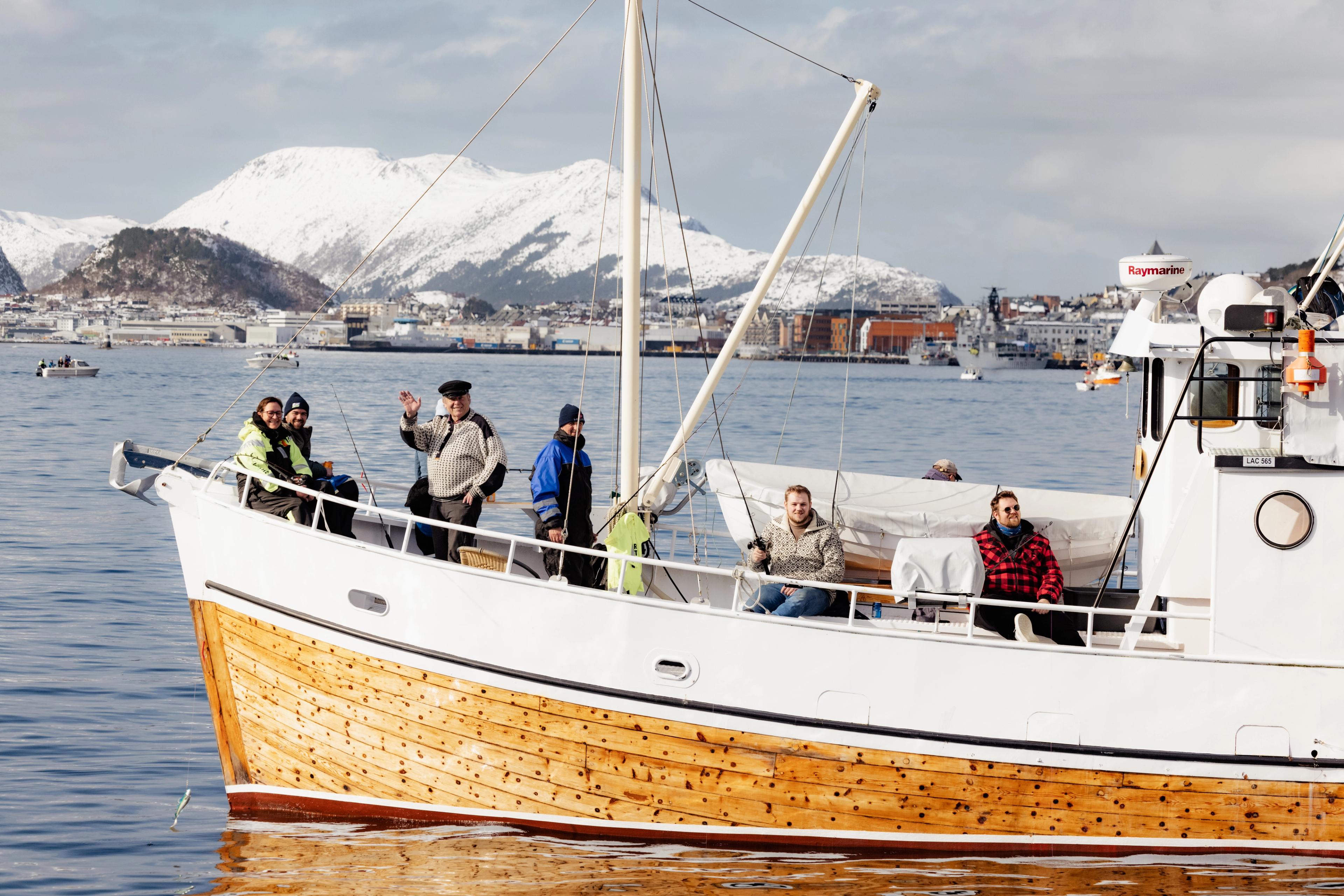 People on a fishing boat during the Borgundfjord fishery