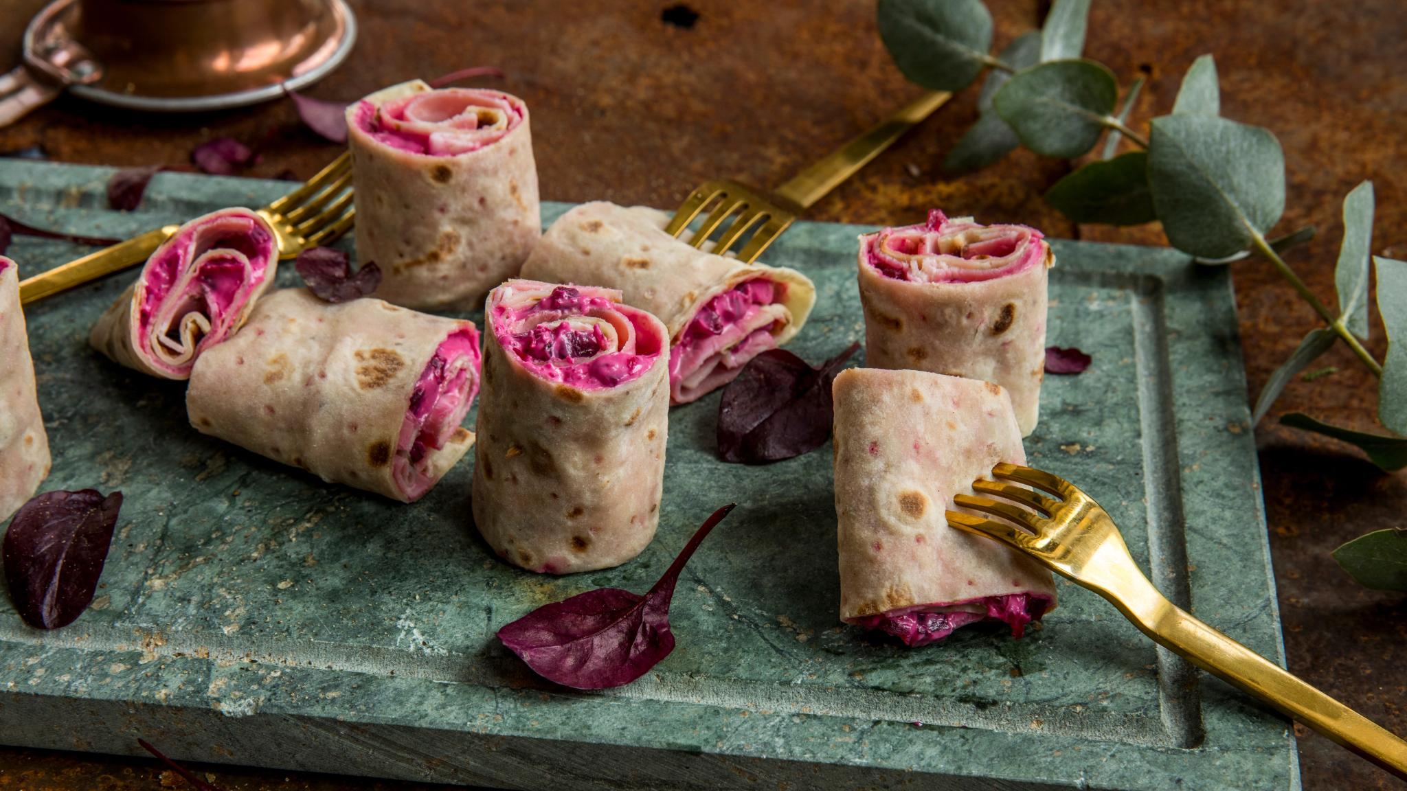 Rolled-up lefse served on a platter in Norway