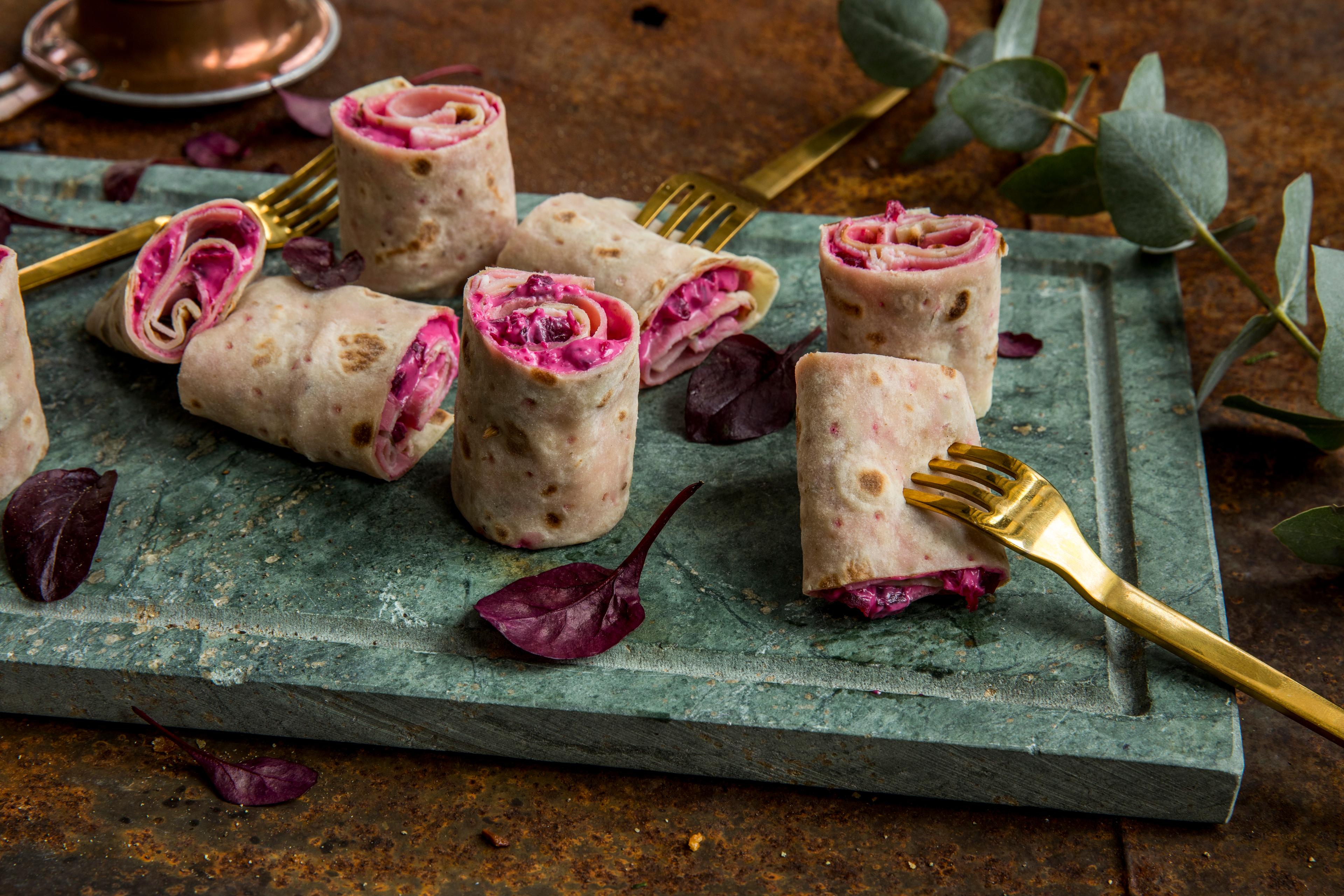 Rolled-up lefse served on a platter in Norway