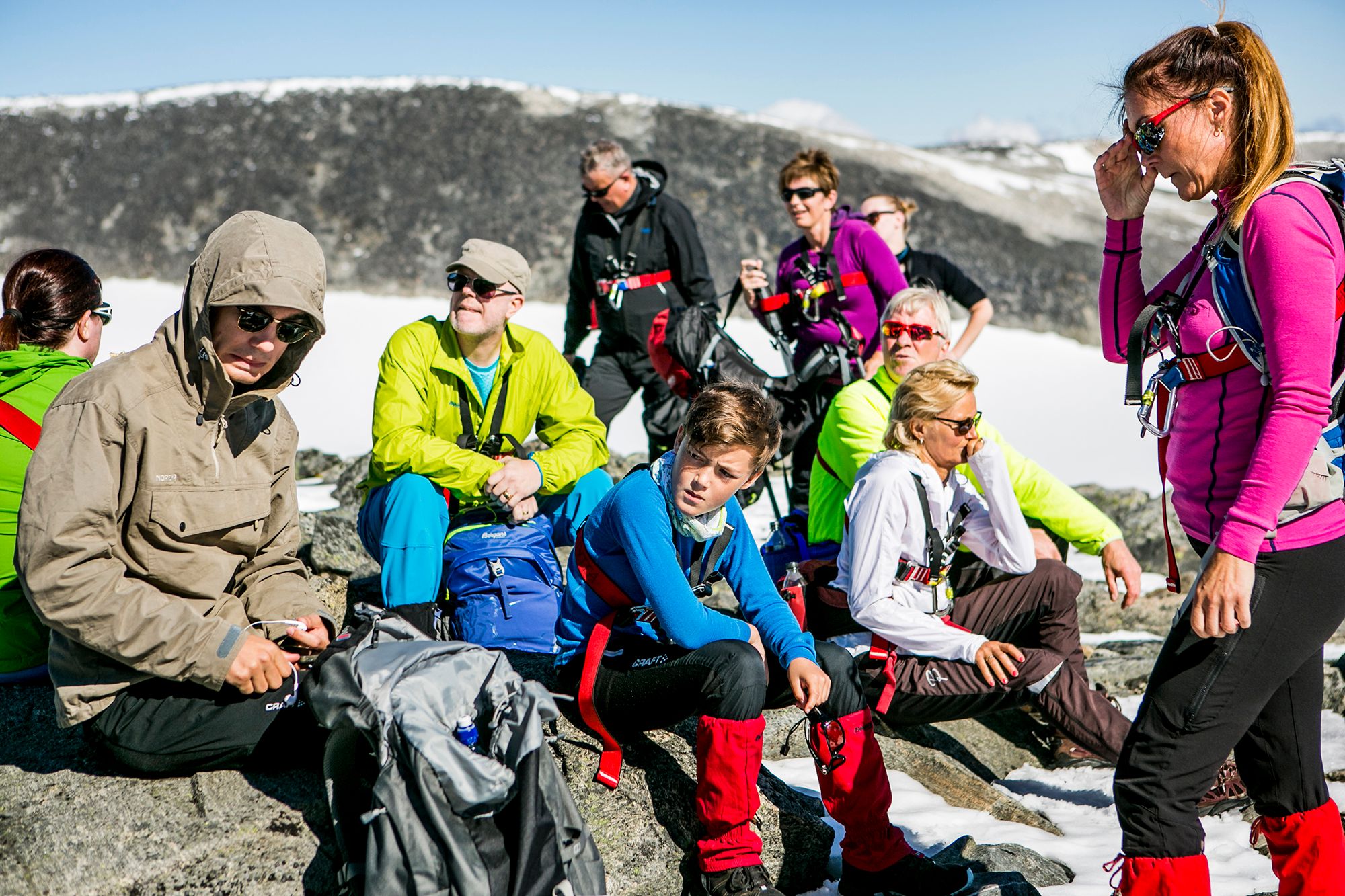 People taking a break on the way to Galdhøpiggen in Jotunheimen