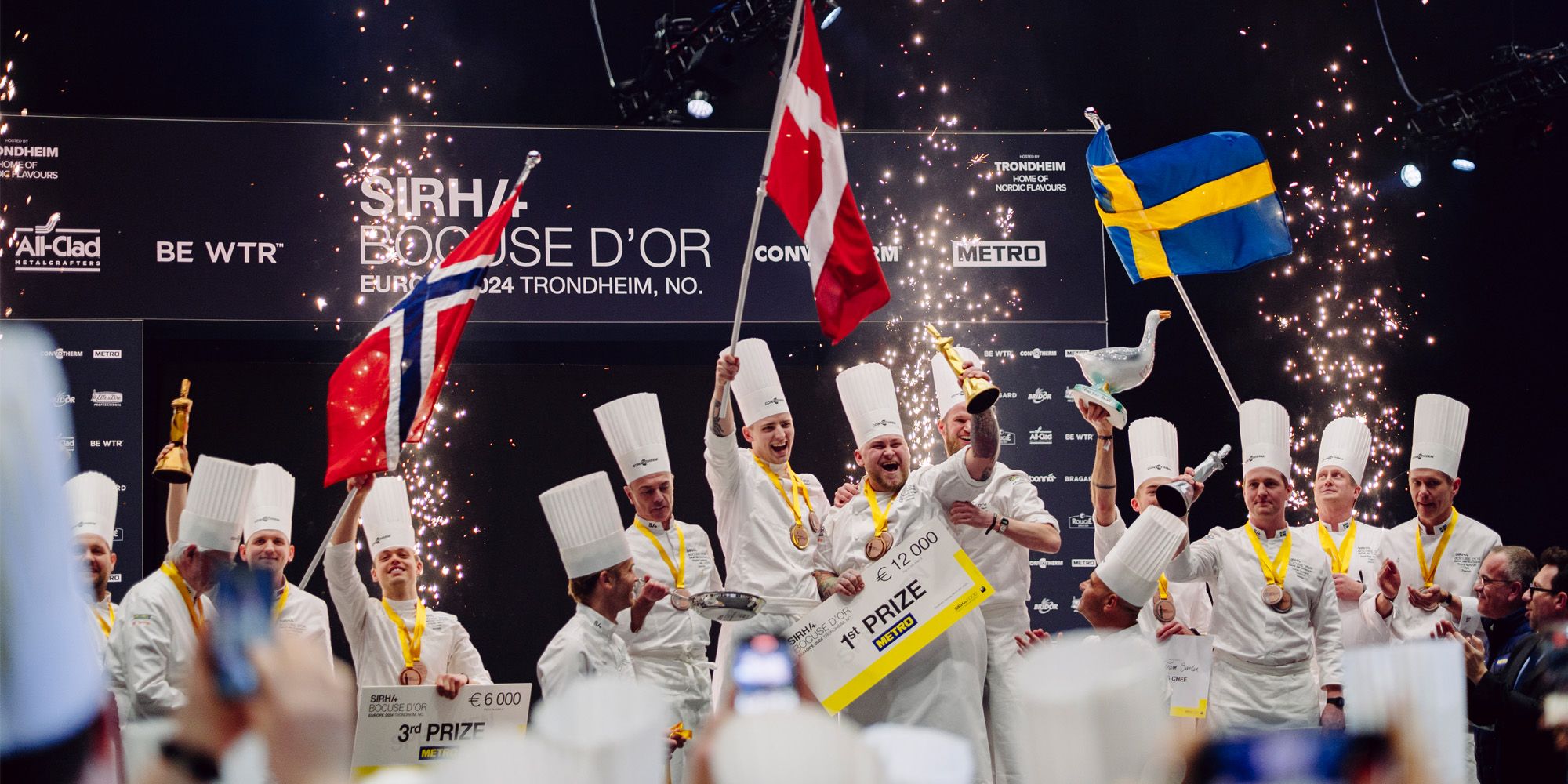 The Norwegian, Danish and Swedish team celebrating on the podium.