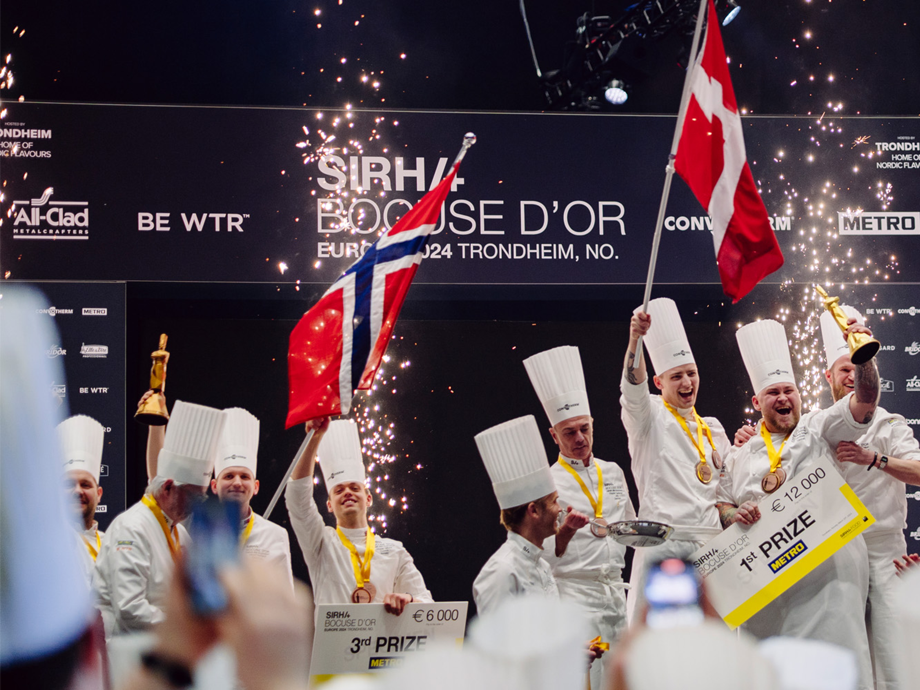 The Norwegian, Danish and Swedish team celebrating on the podium.