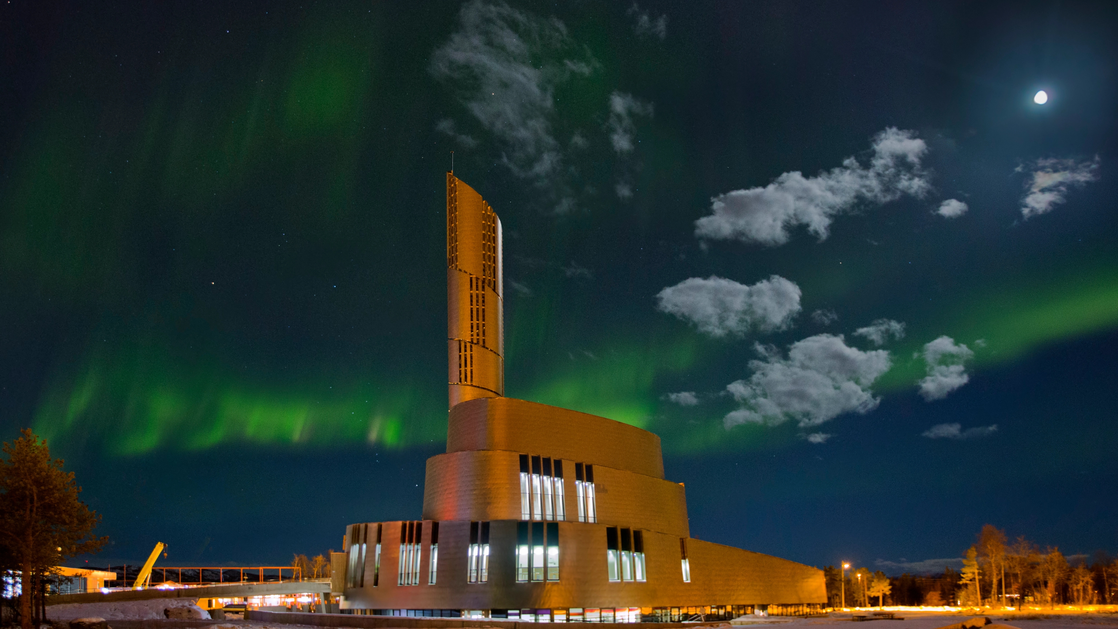 Nordlyskatedralen Cathedral in Alta surrounded by northern lights