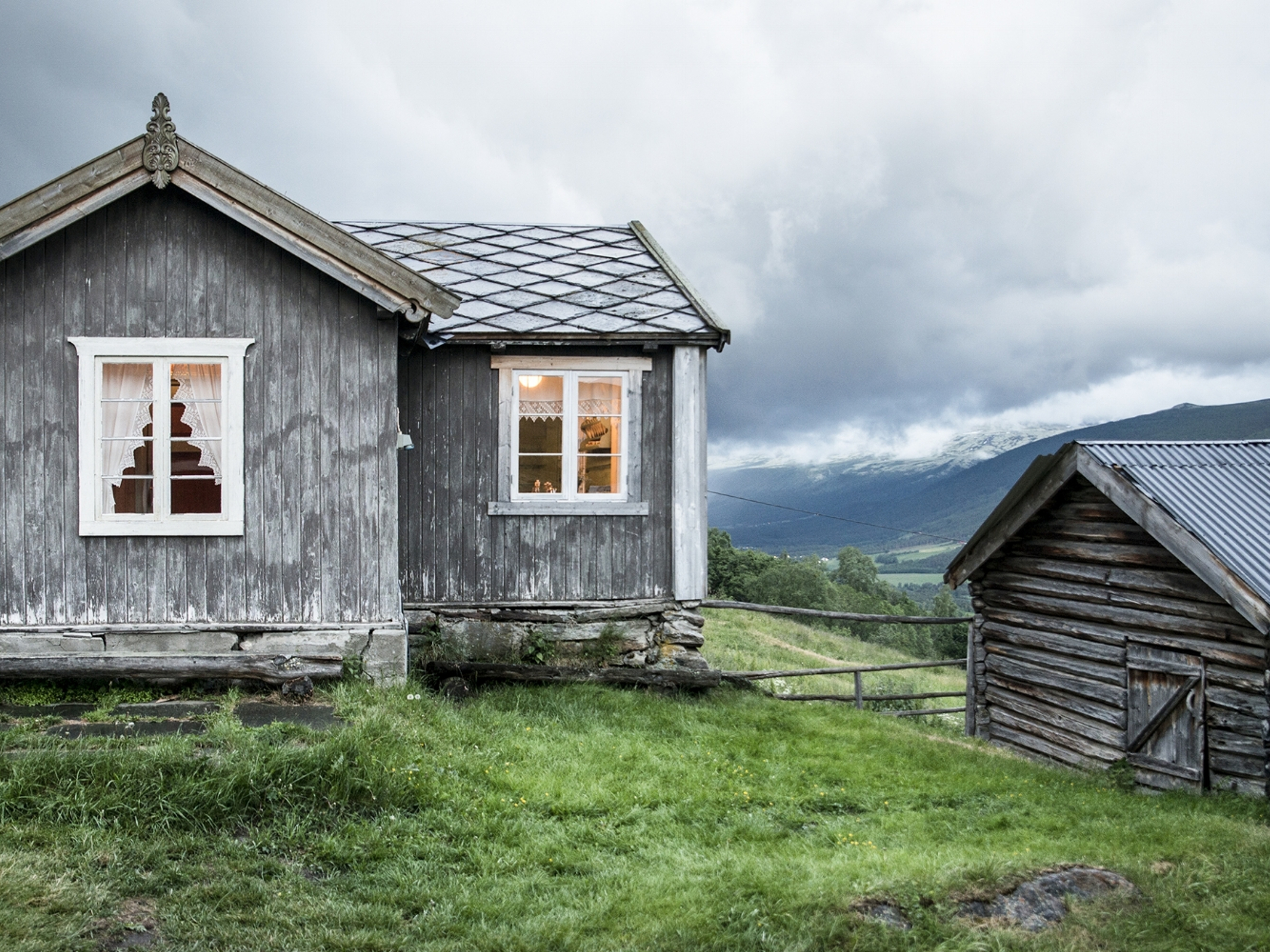The grey houses of the farm Budsjord in the Gudbrandsdalen valley, Norway