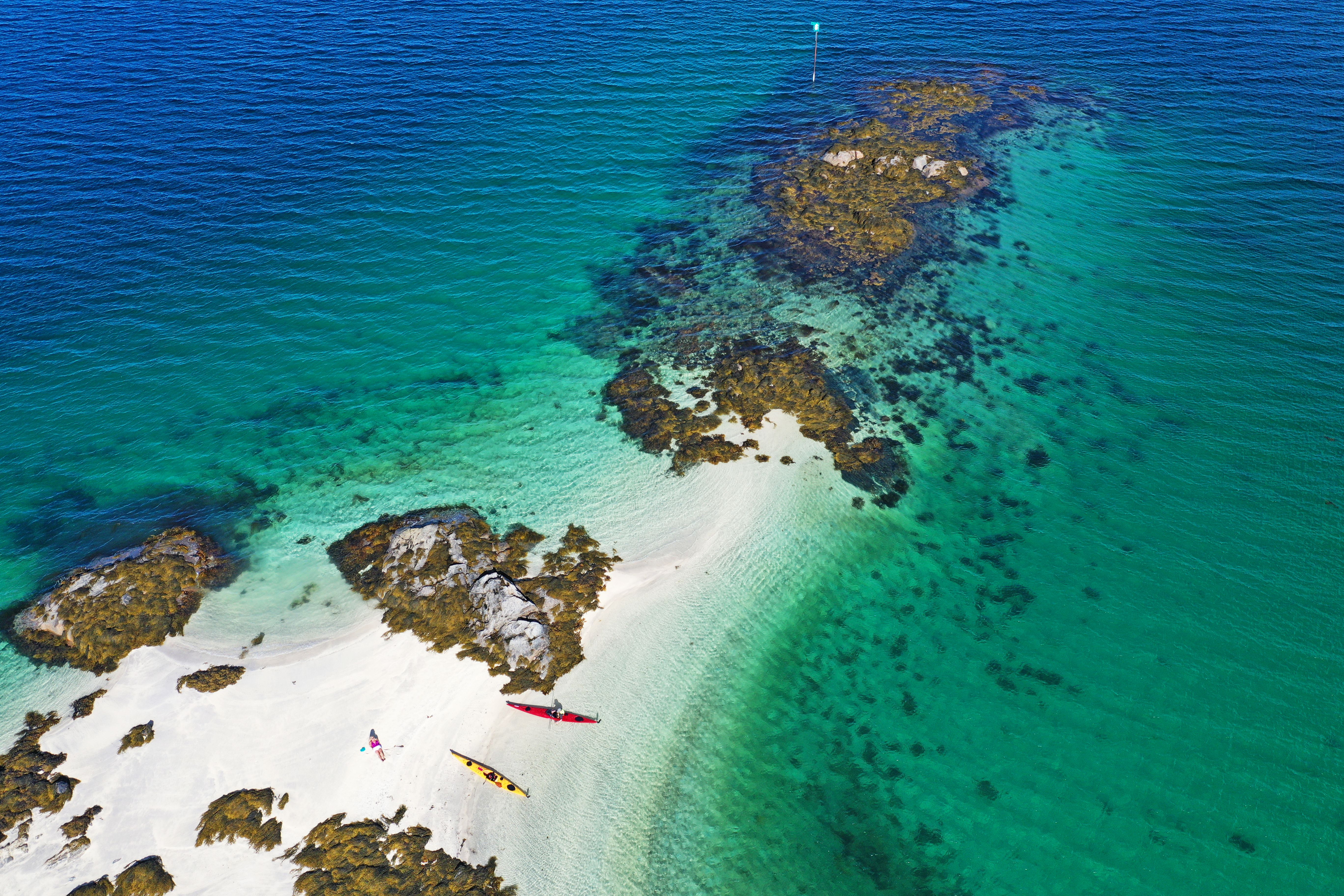 Kayaking in crystal clear water in Steigen, Northern Norway