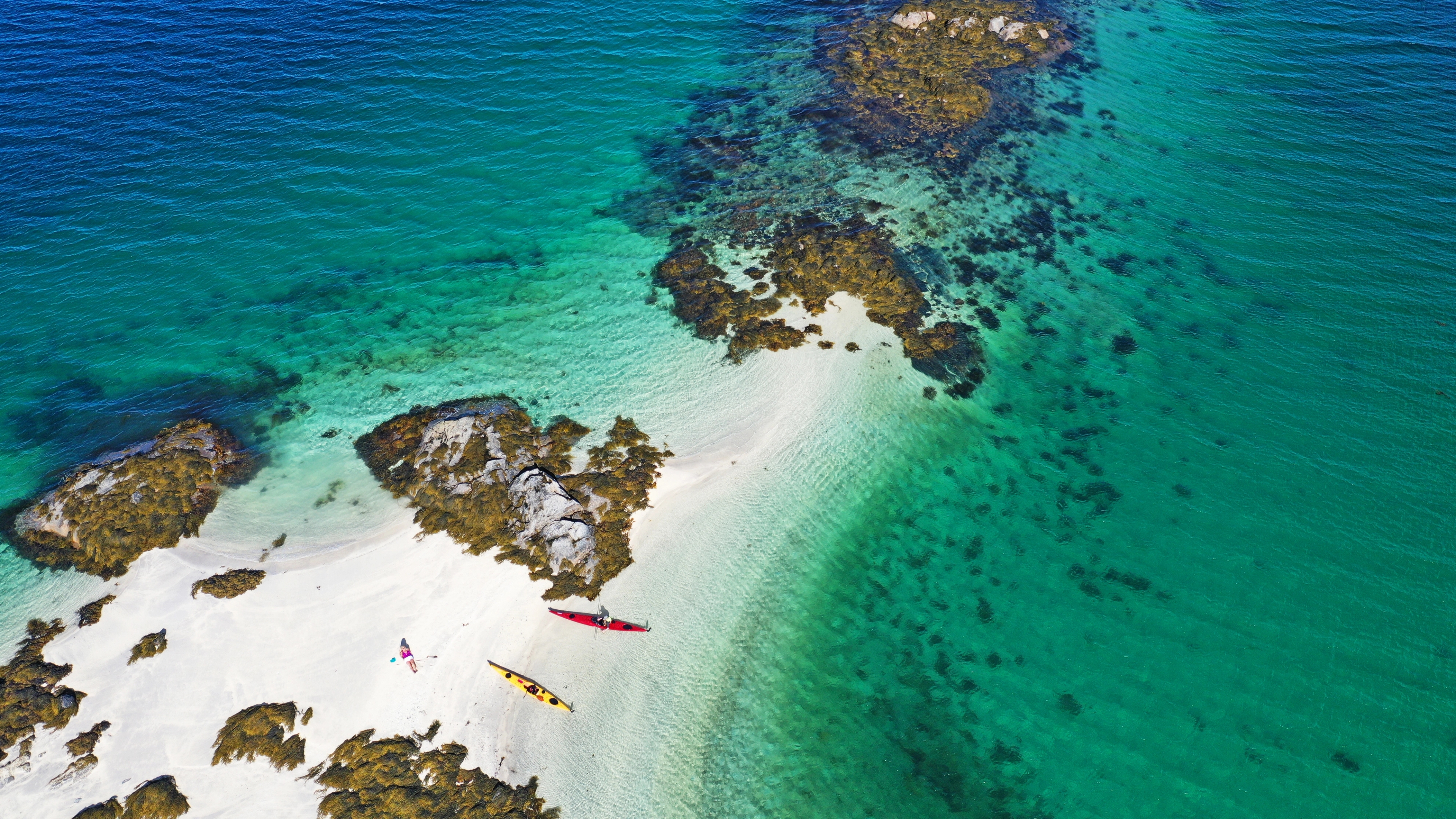 Kayaking in crystal clear water in Steigen, Northern Norway