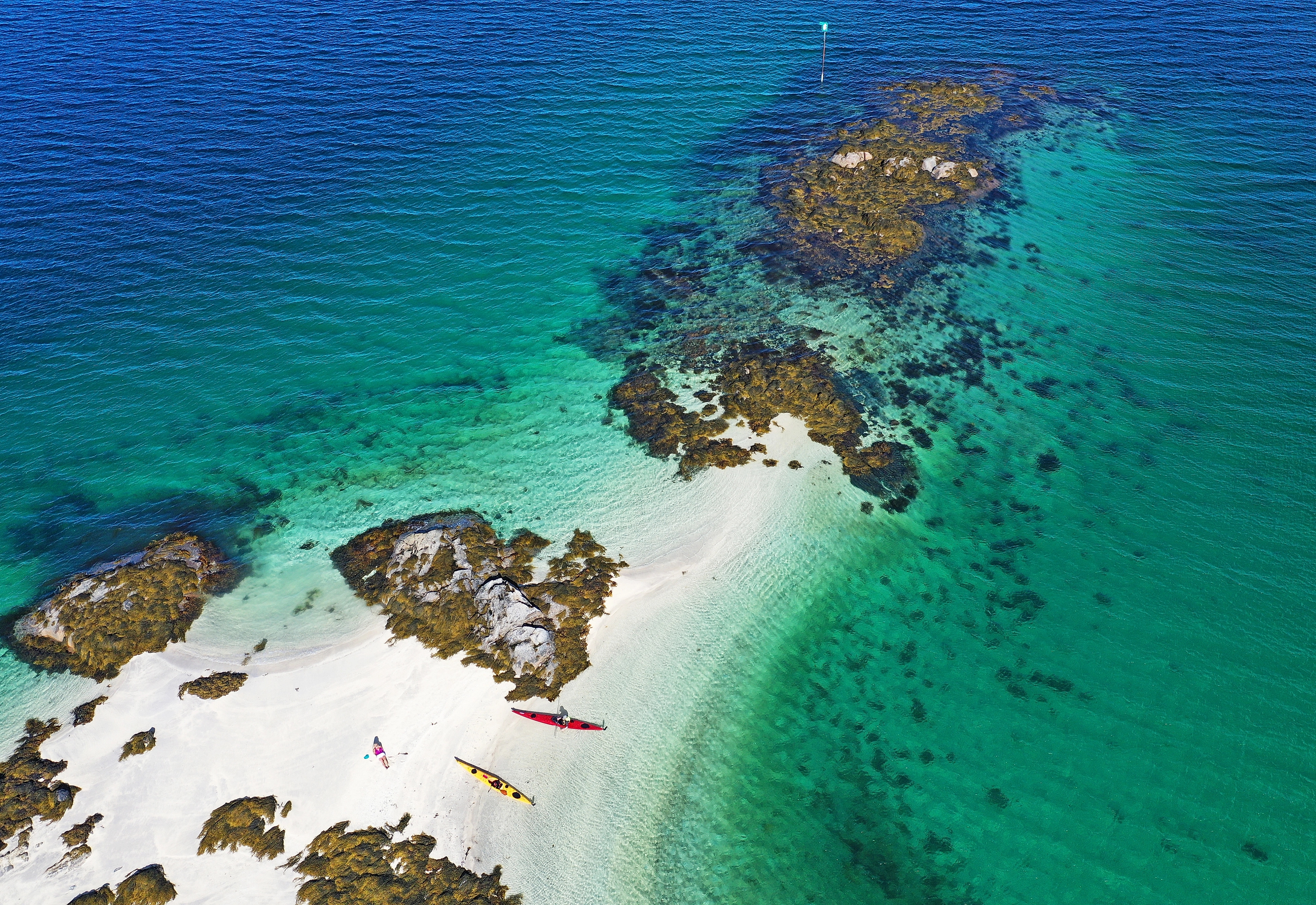 Kayaking in crystal clear water in Steigen, Northern Norway
