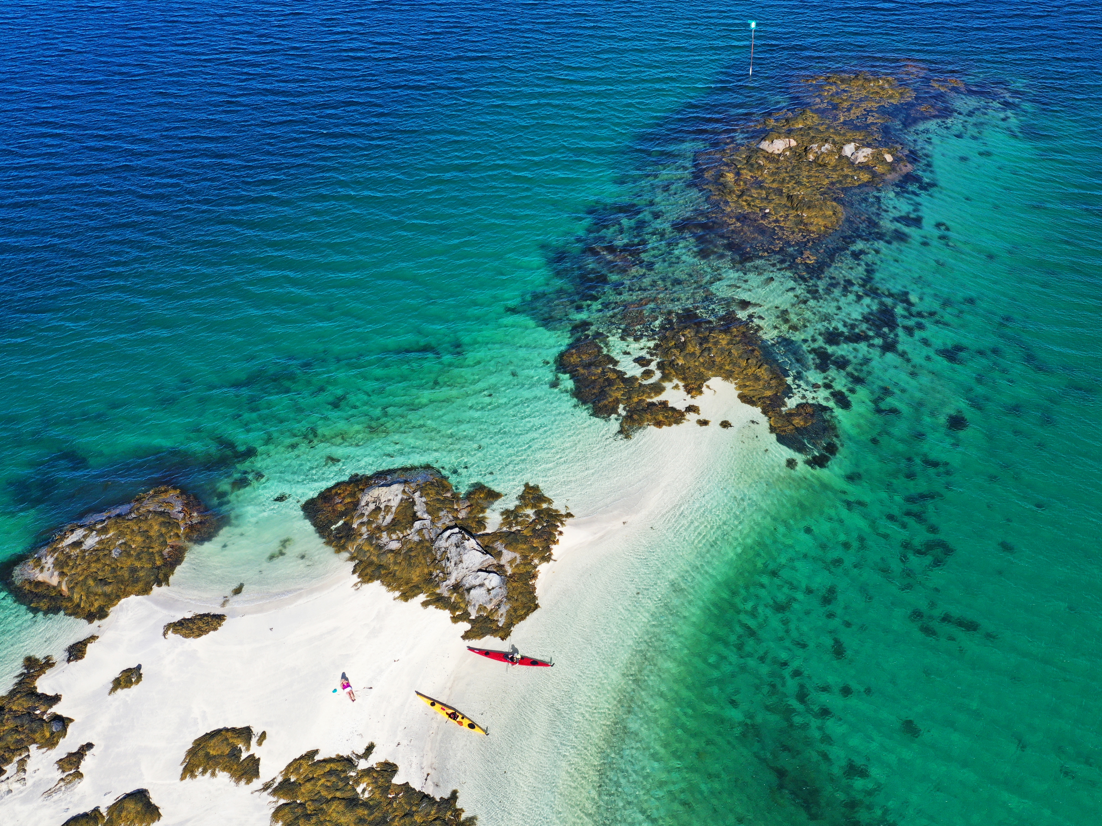 Kayaking in crystal clear water in Steigen, Northern Norway