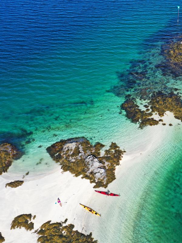 Kayaking in crystal clear water in Steigen, Northern Norway