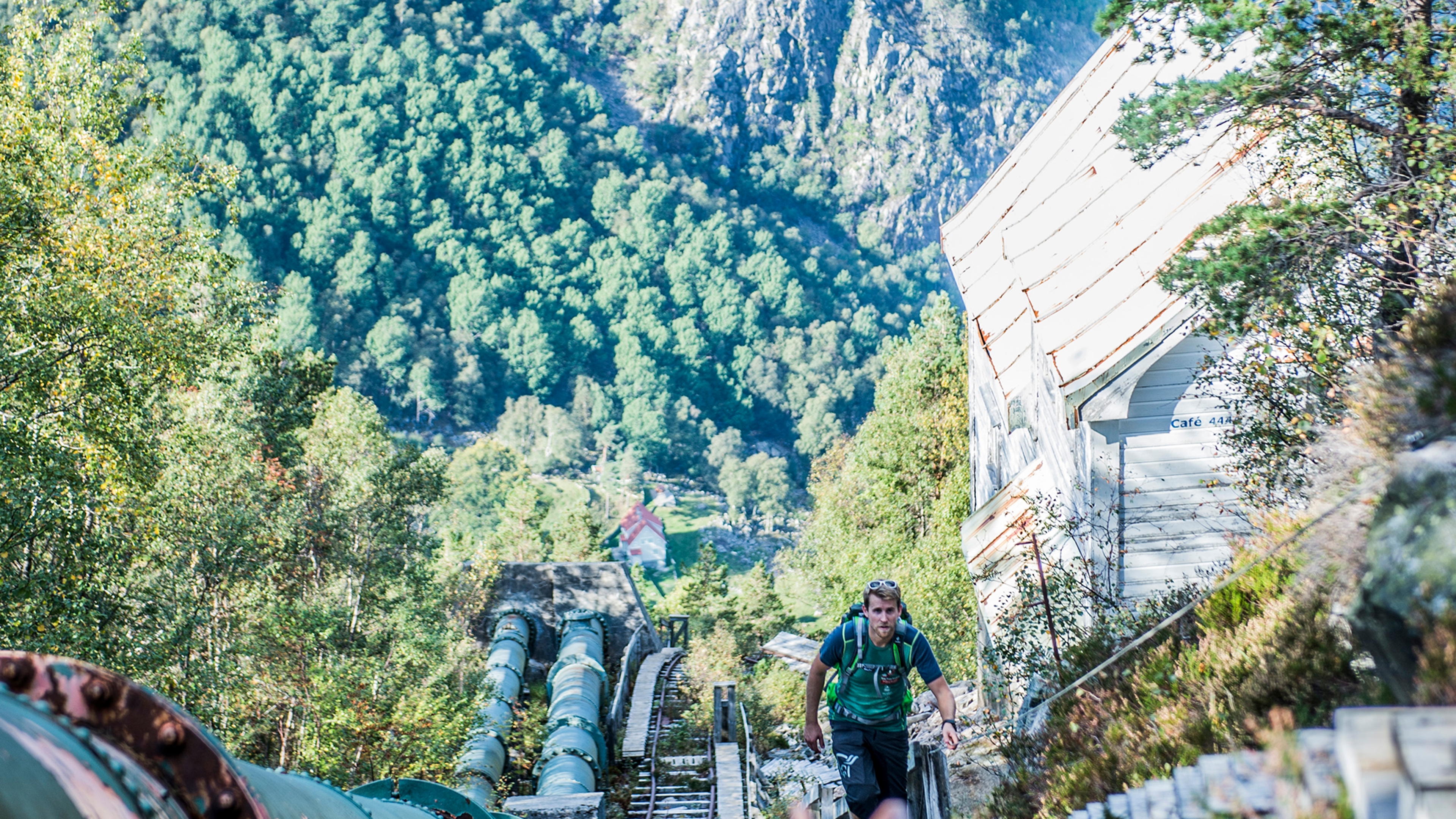 Person hiking the Flørlitrappene strais by the Lysefjord in Ryfylke, Fjord Norway