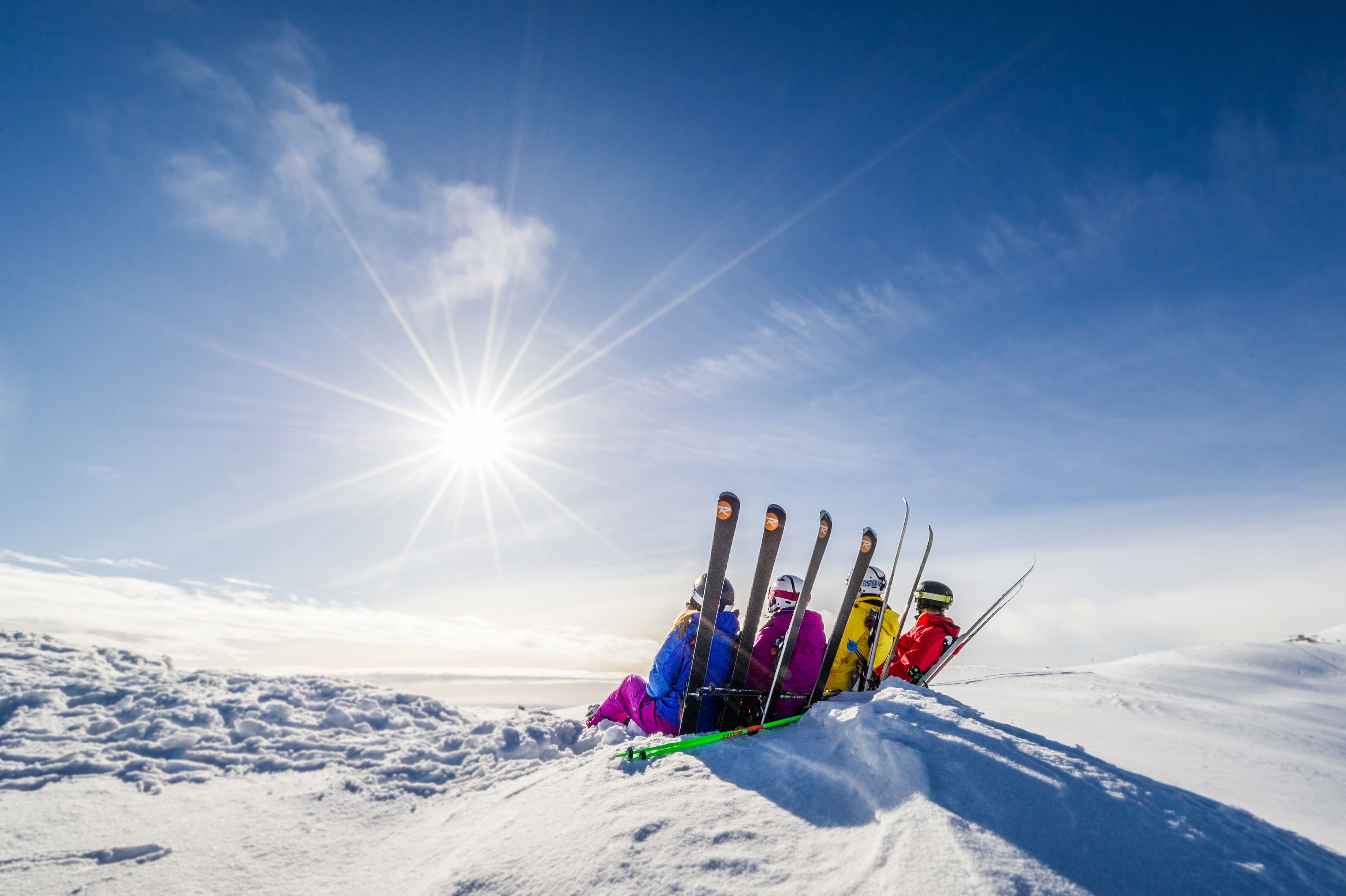Skiers enjoying a sunny easter day from the mountain top in Trysil, Eastern Norway