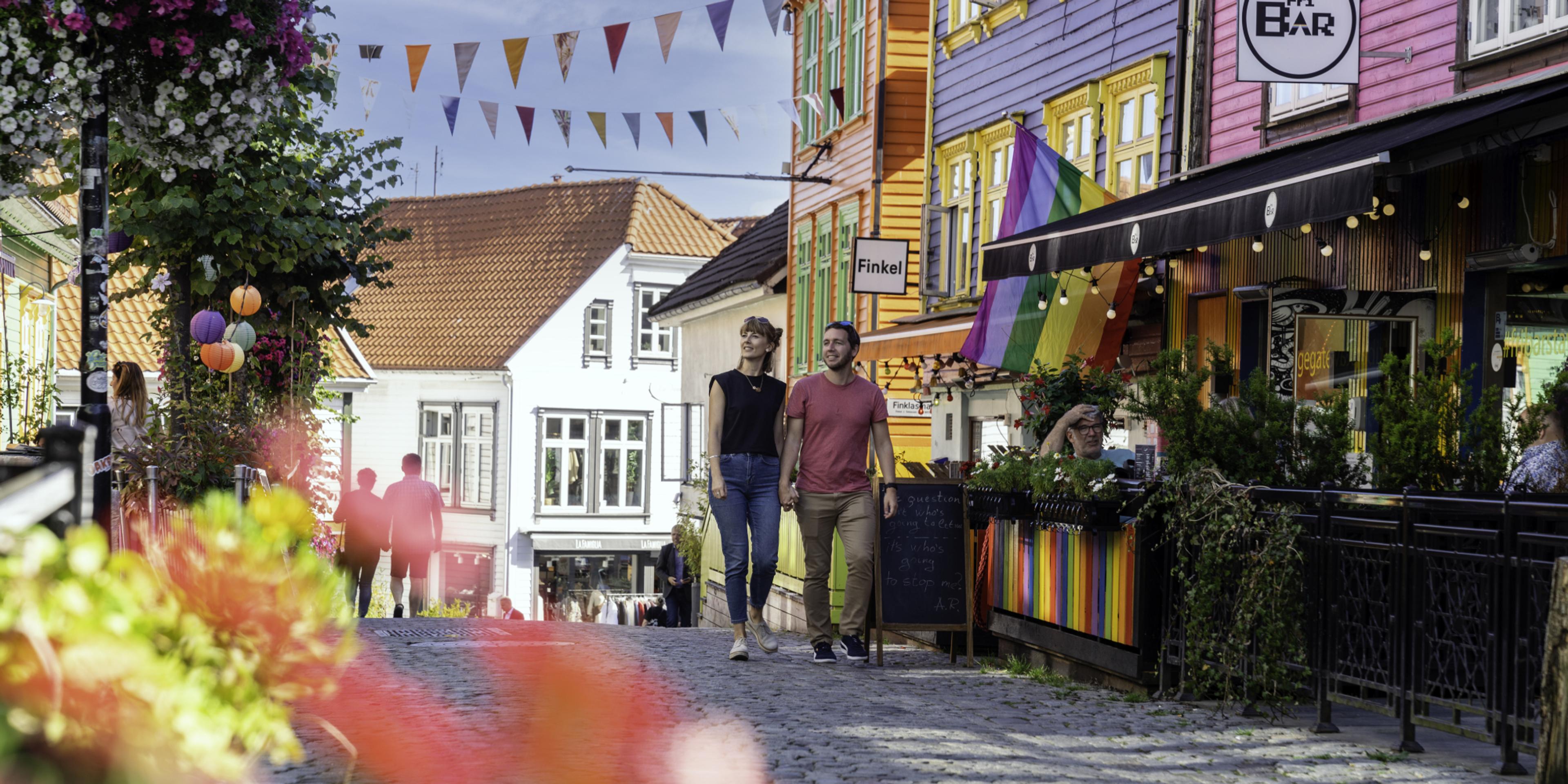 Couple sightseeing in the Color Street in Stavanger