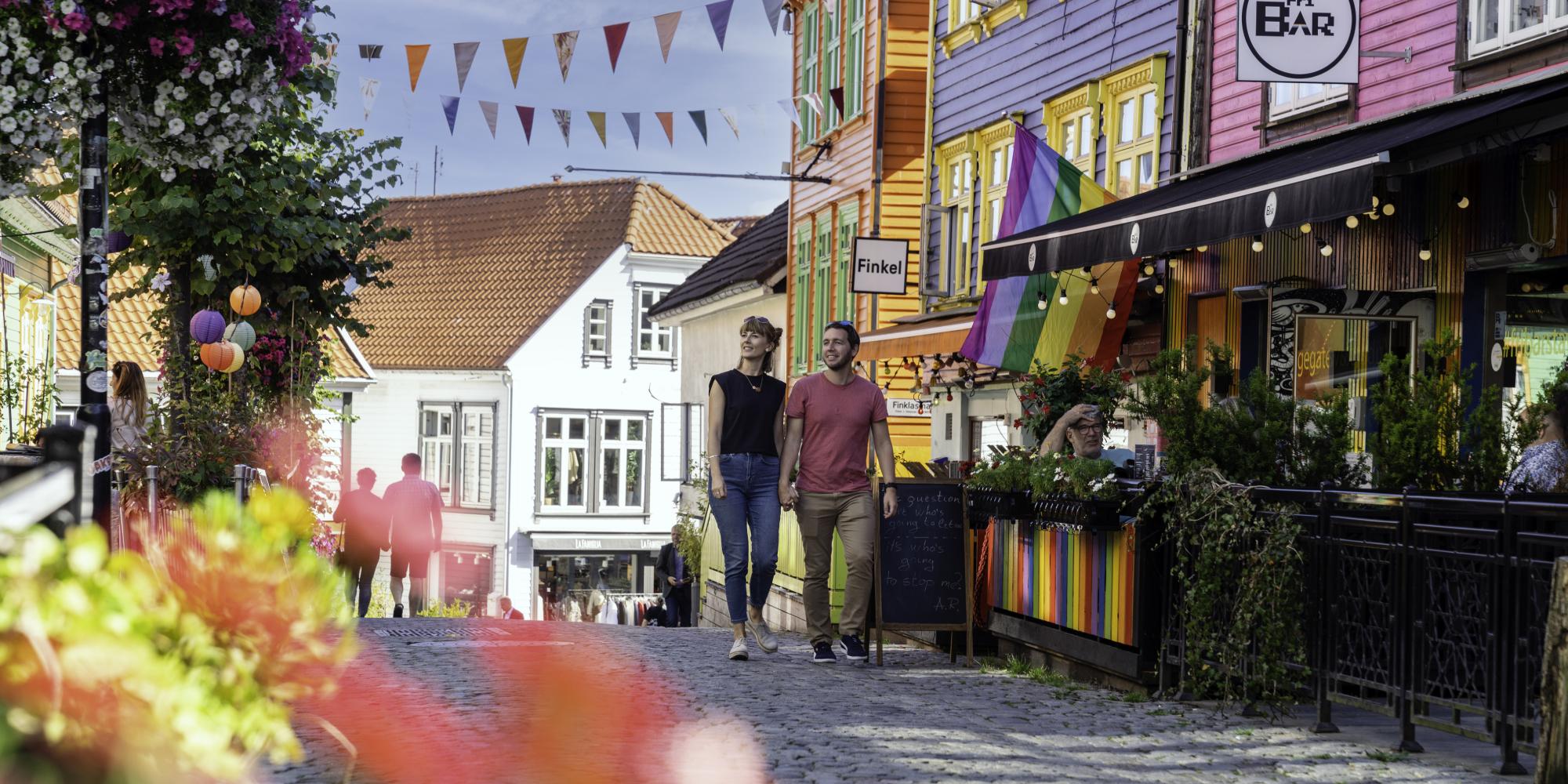 Couple sightseeing in the Color Street in Stavanger
