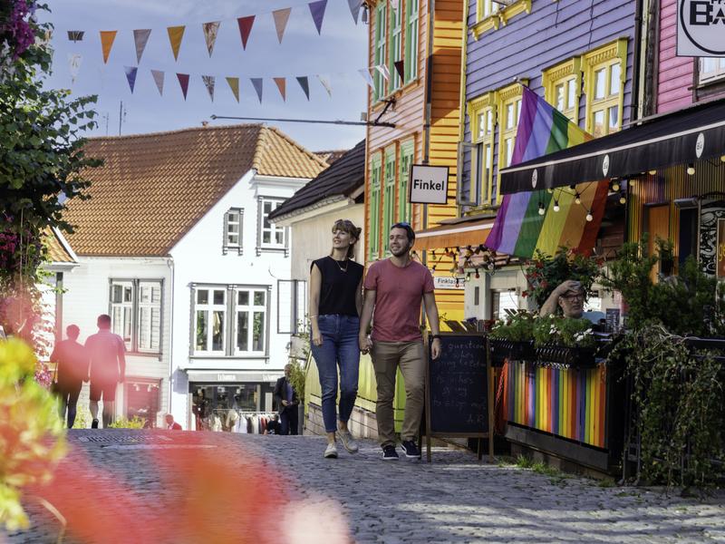 Couple sightseeing in the Color Street in Stavanger