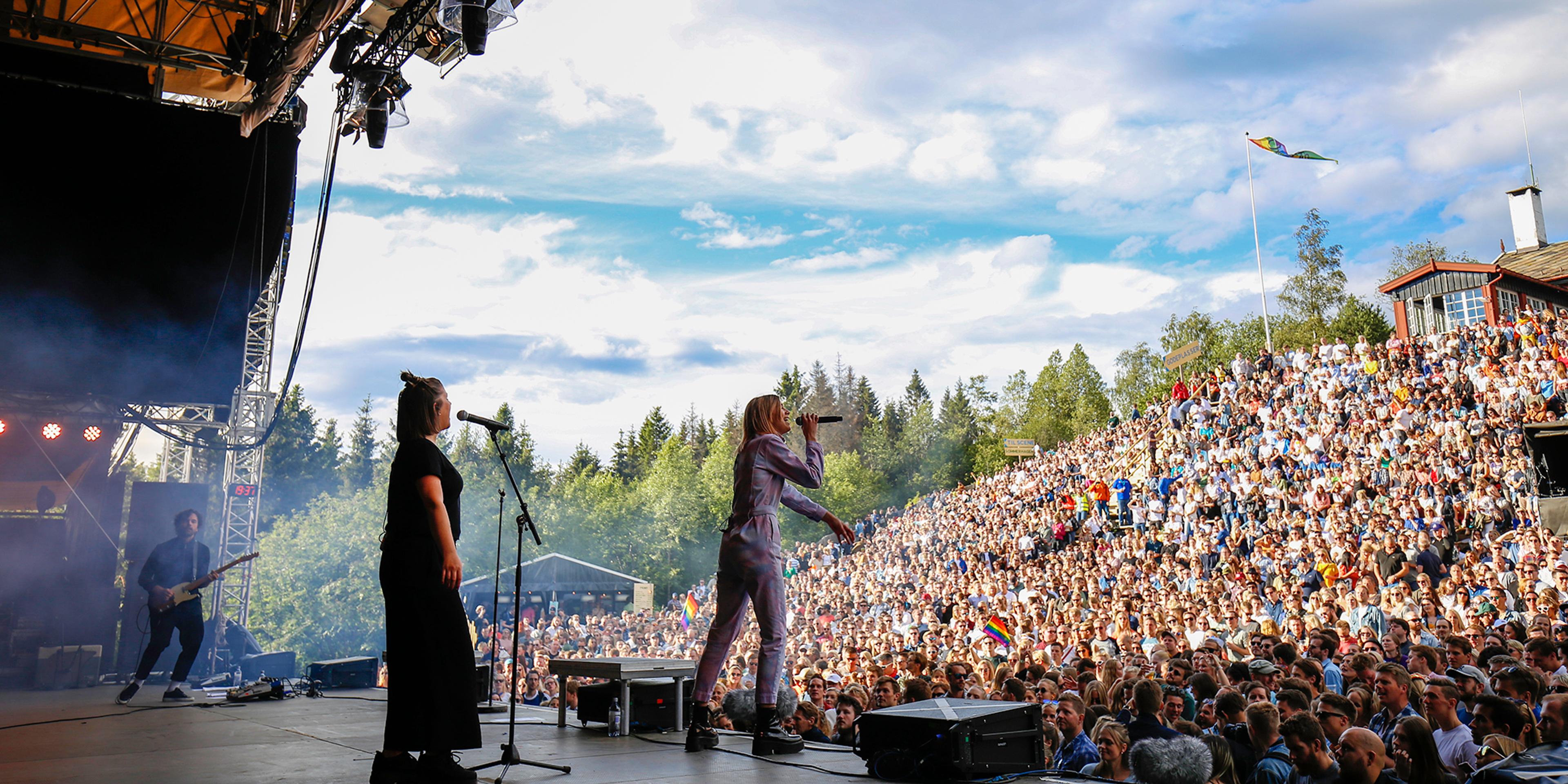 Musican performing in front of a large crowd at OsloOslo music festival at Grefsenkollen in Oslo, Eastern Norway