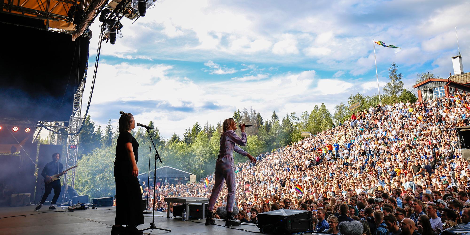 Musican performing in front of a large crowd at OsloOslo music festival at Grefsenkollen in Oslo, Eastern Norway