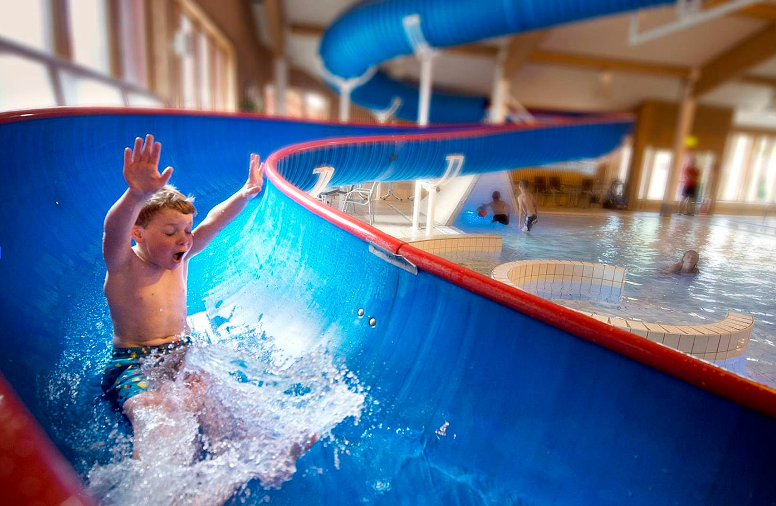 A boy enjoying Jorekstad bathing facilities, in Hafjell