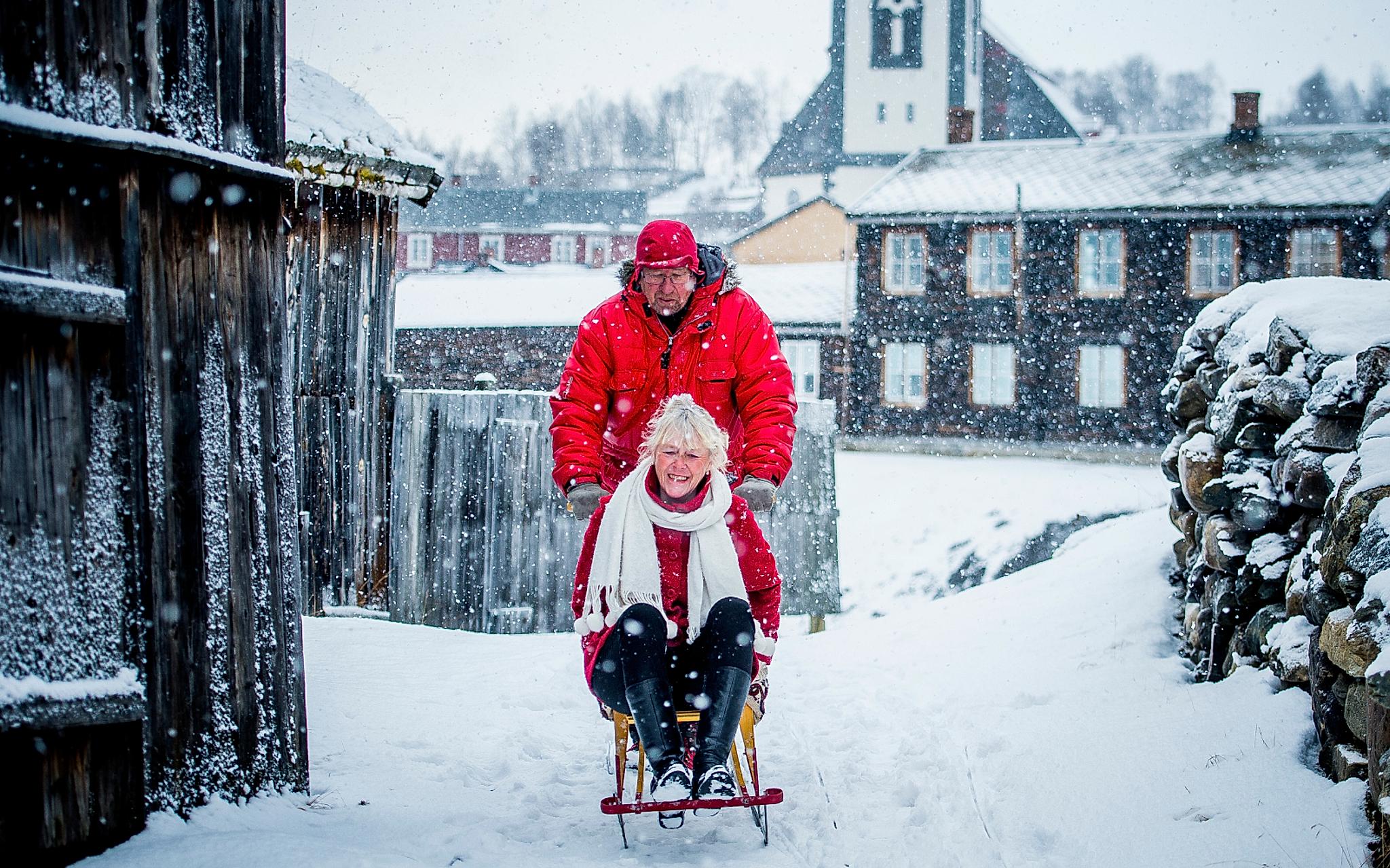 A couple at kicksled at Røros in Trøndelag, Norway.