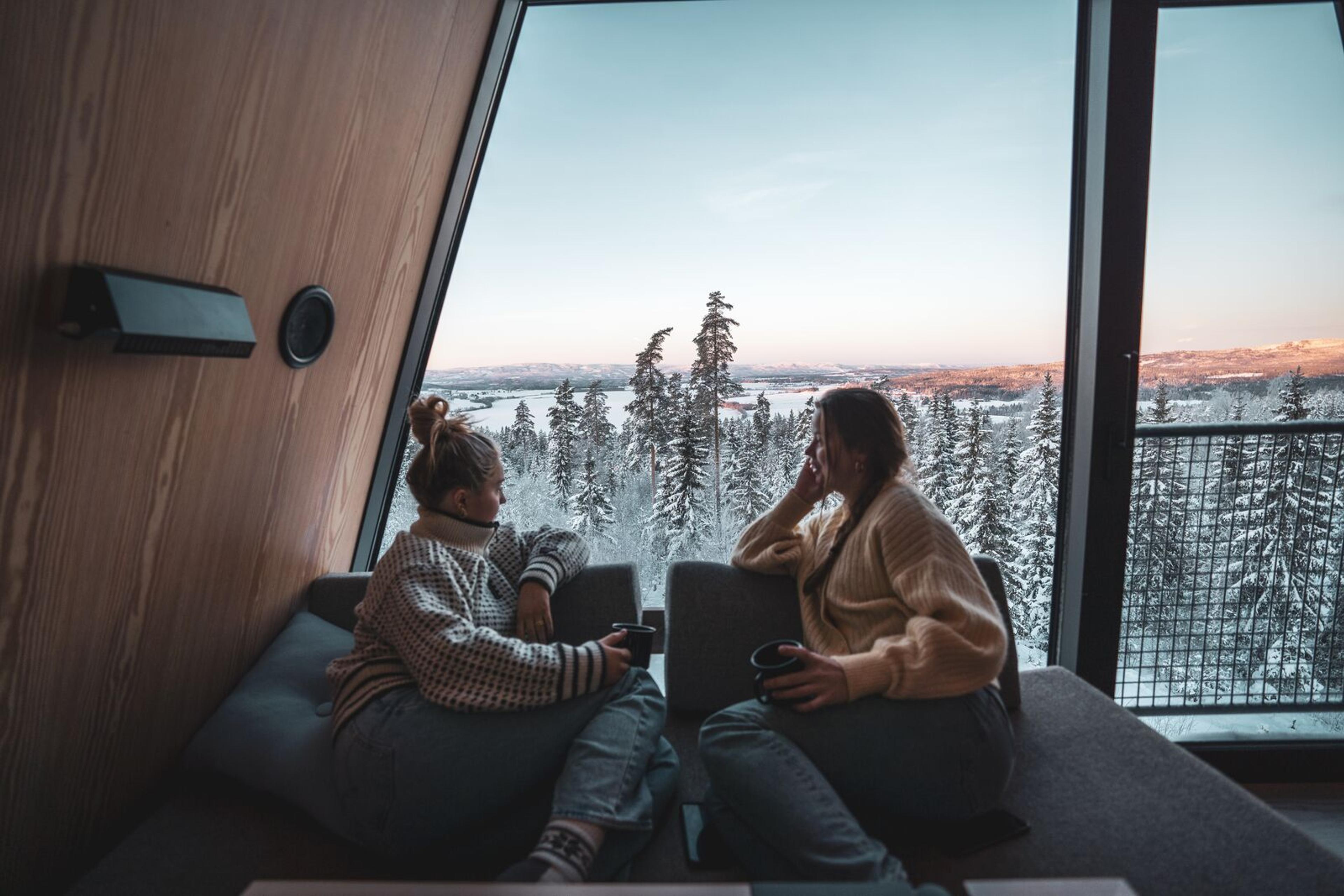 Two friends enjoying a stay at PAN Treetrop cabins