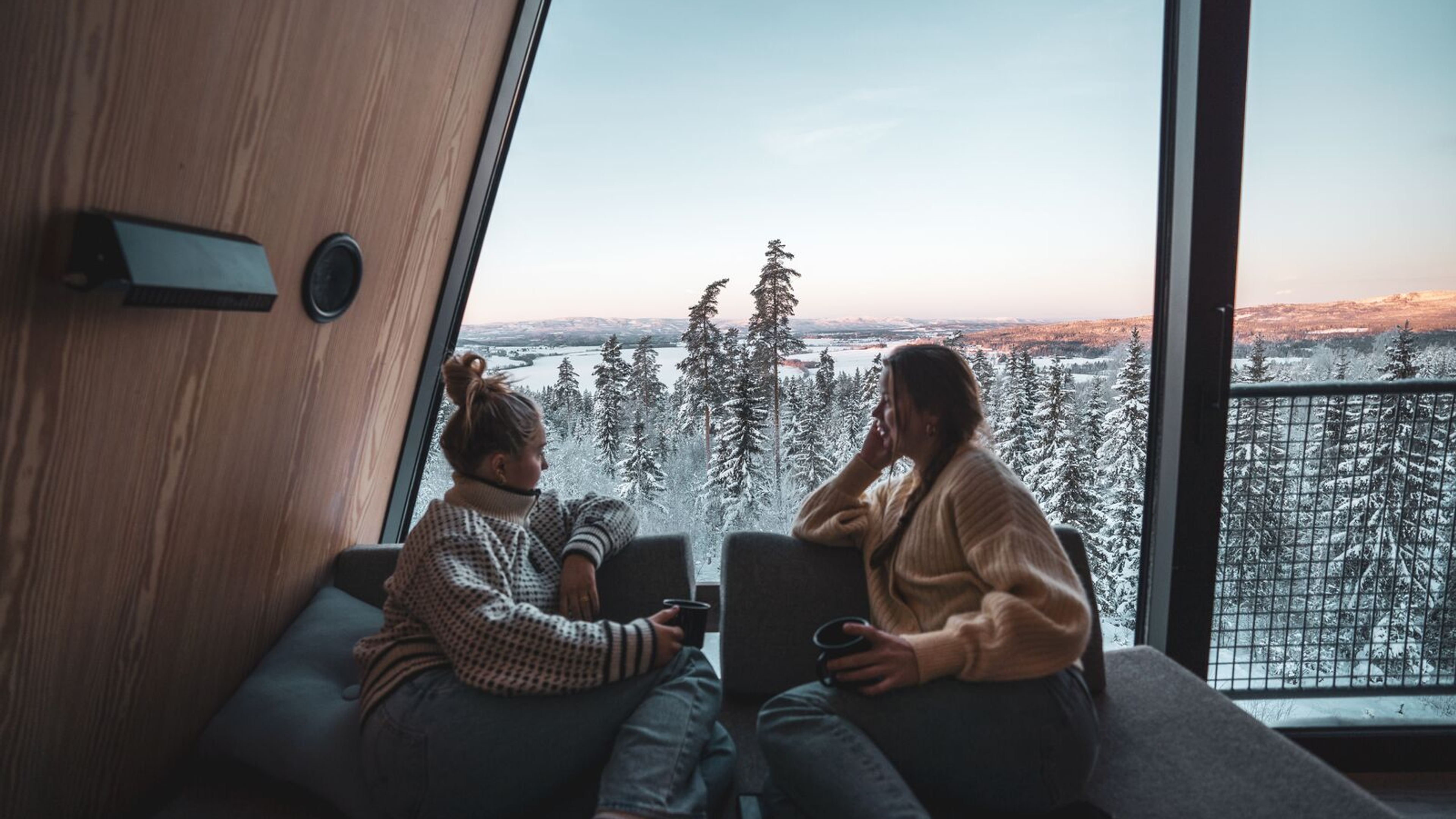 Two friends enjoying a stay at PAN Treetrop cabins