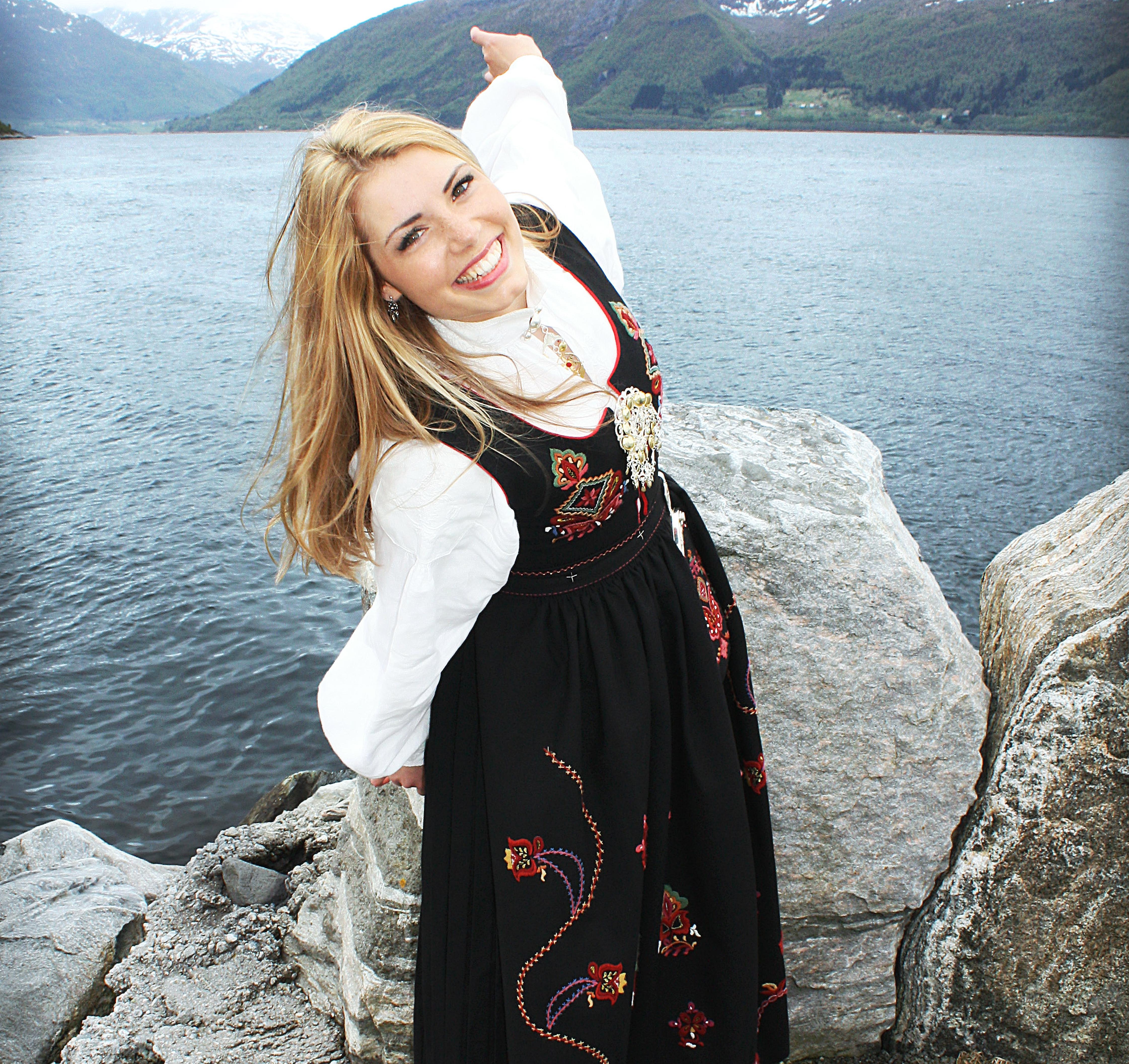 Woman dressed in a traditional costume bunad from Sunnmøre in Volda in Fjord Norway