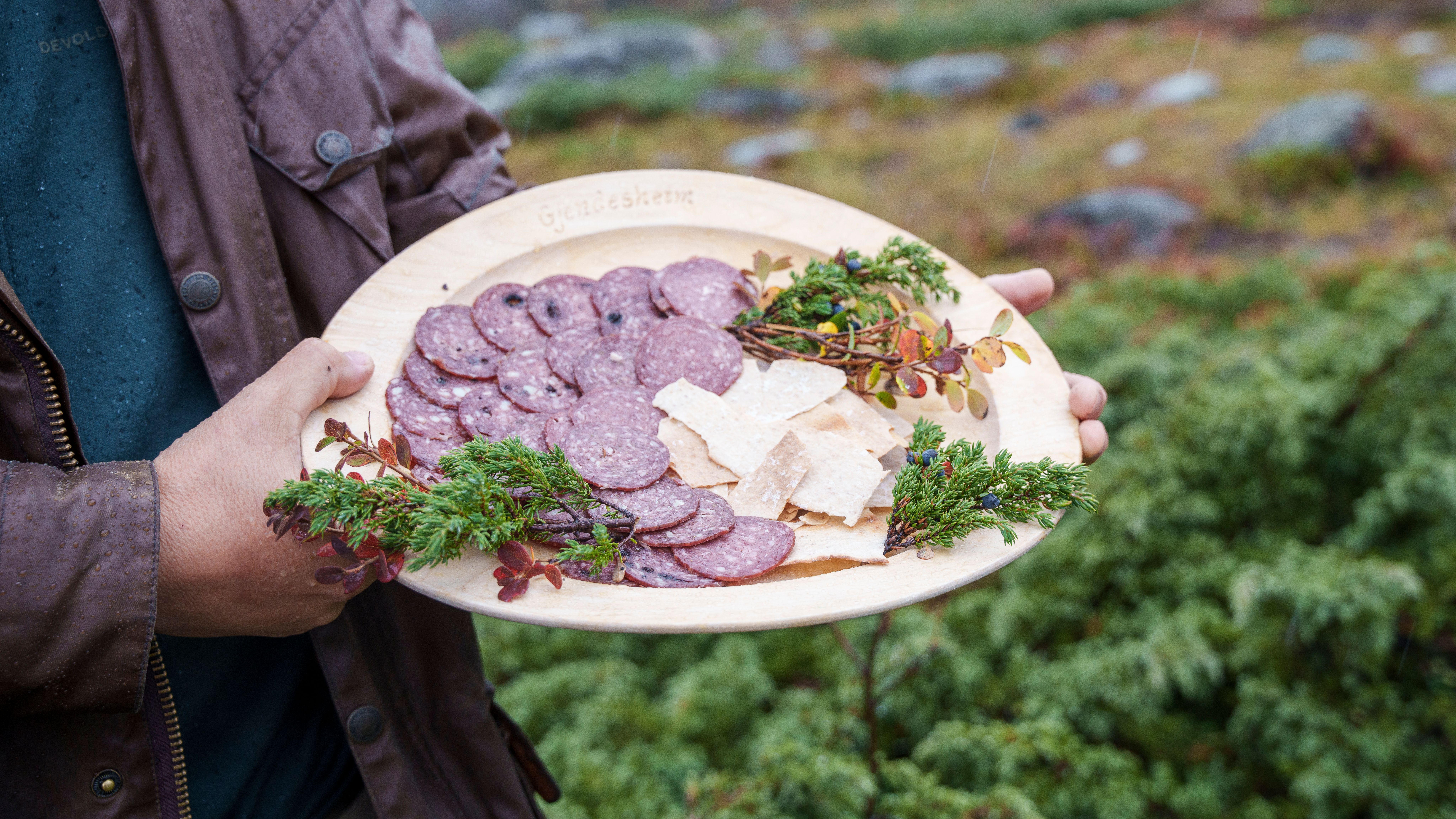Local cured sausage on a plate.