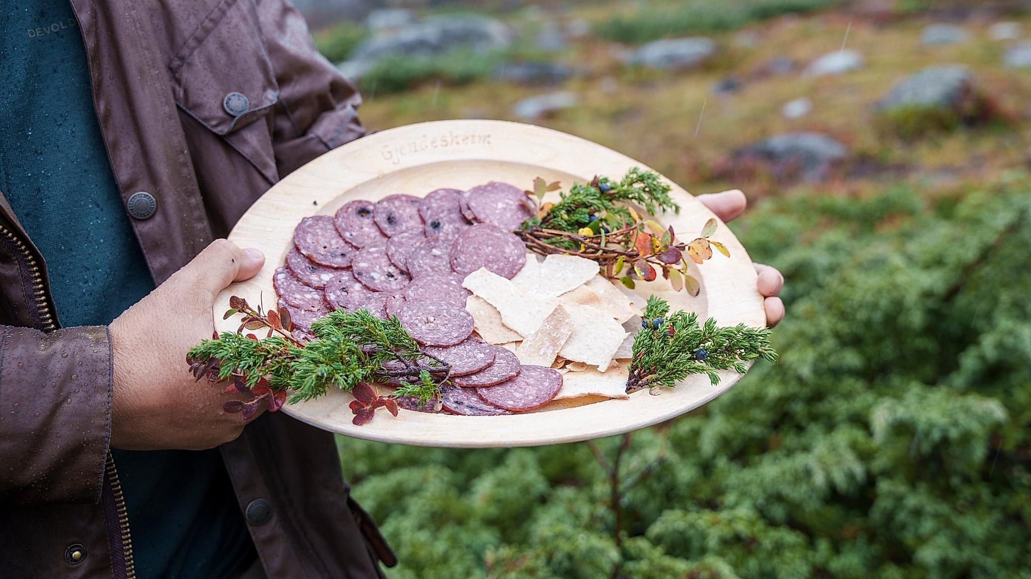 Local cured sausage on a plate.