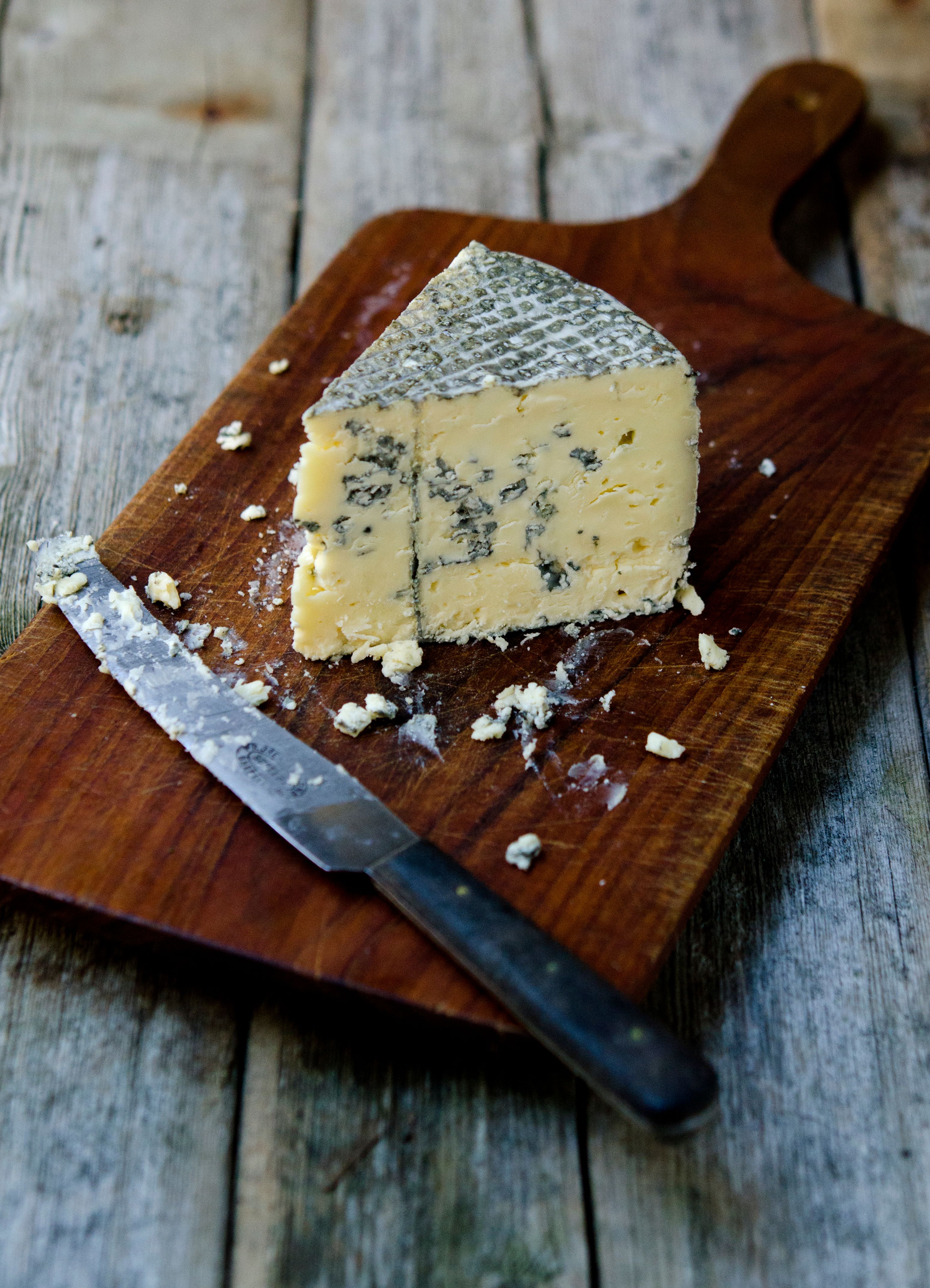 Kraftkar cheese from Tingvollost on a table in Northwest, Fjord Norway.