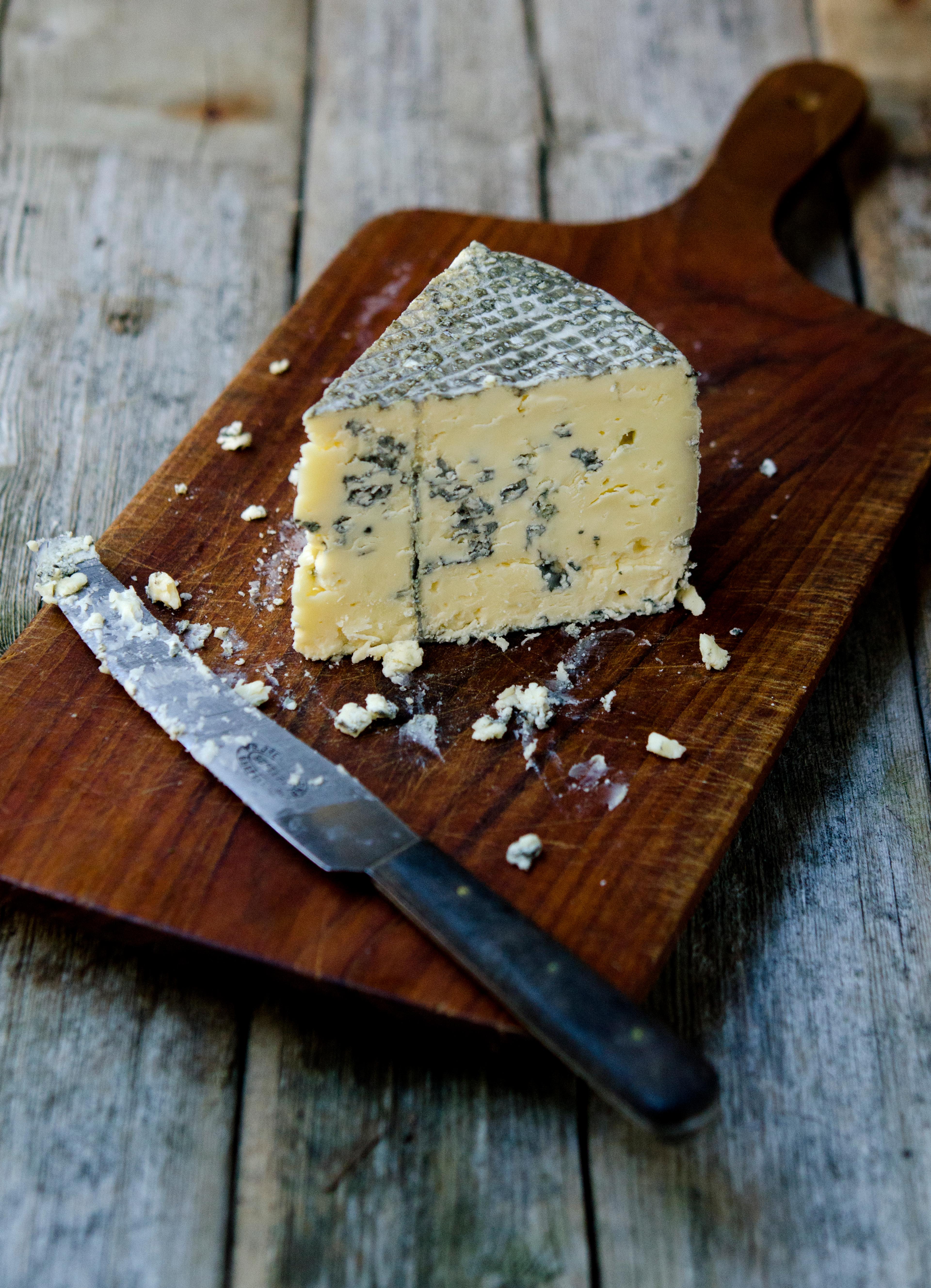 Kraftkar cheese from Tingvollost on a table in Northwest, Fjord Norway.