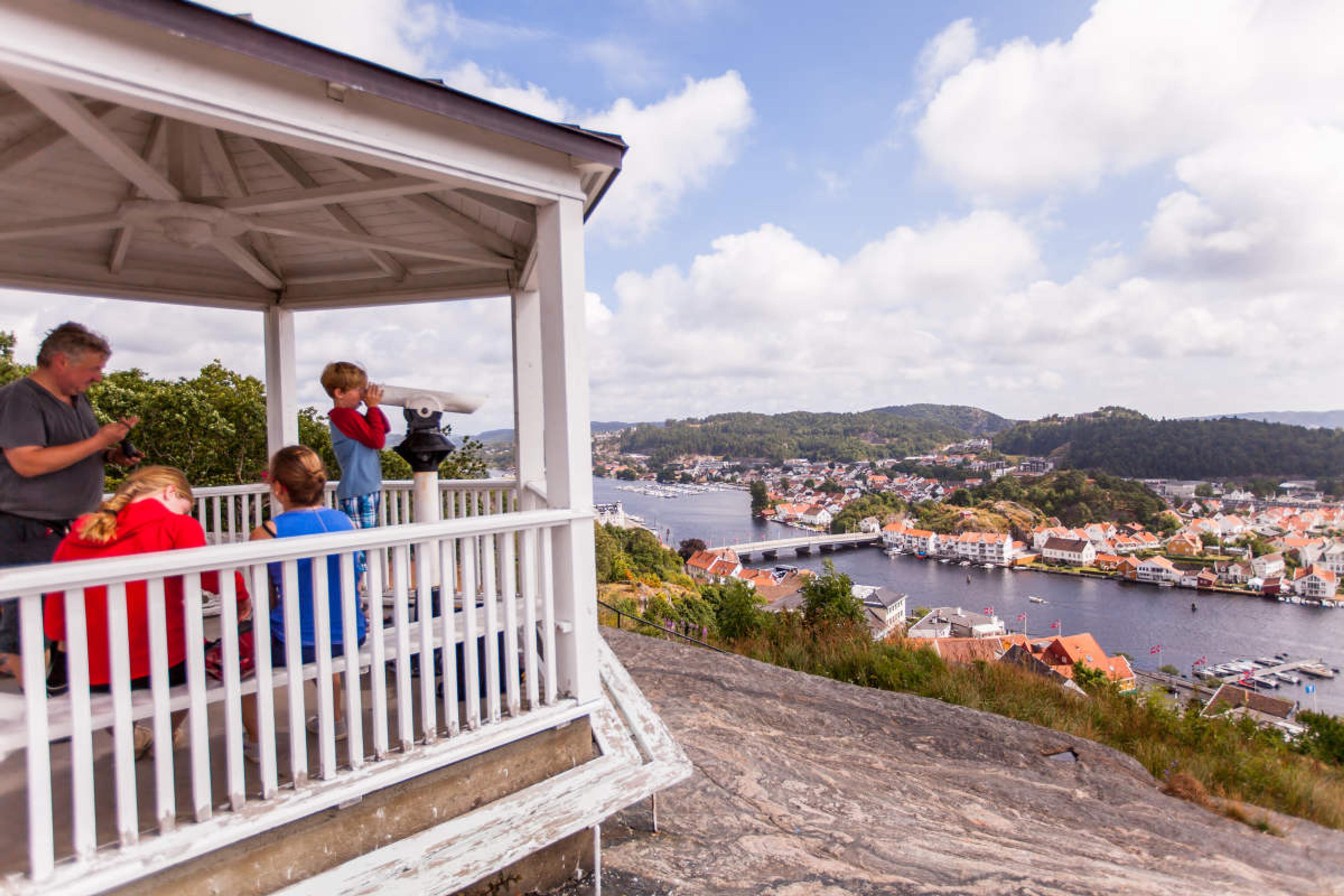 A family at the Uranienborg viewpoint in Mandal, Southern Norway