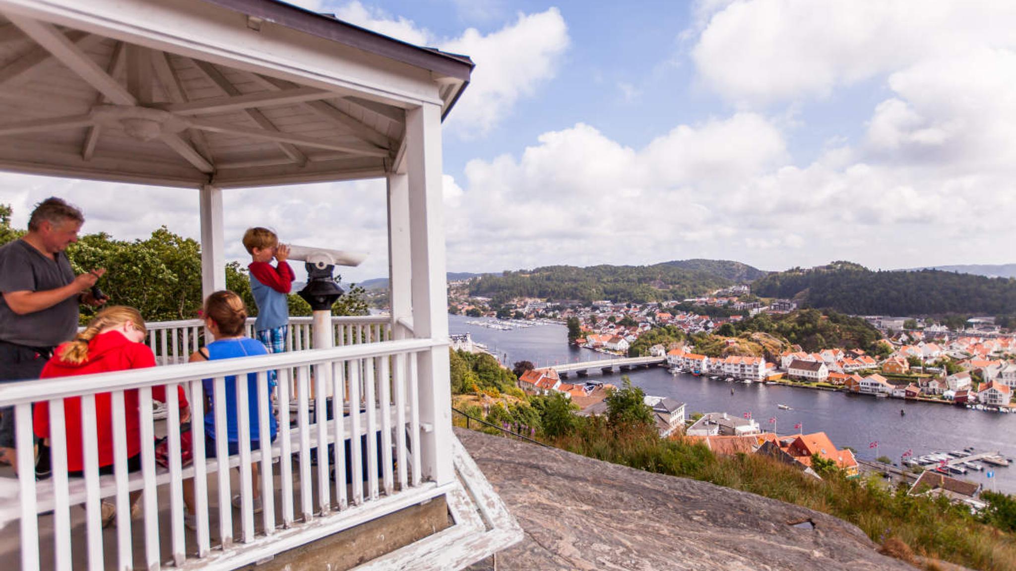 A family at the Uranienborg viewpoint in Mandal, Southern Norway