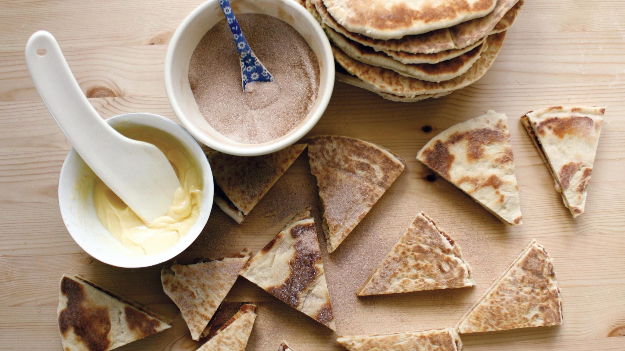 Lefse with butter, sugar and cinnamon served in Norway