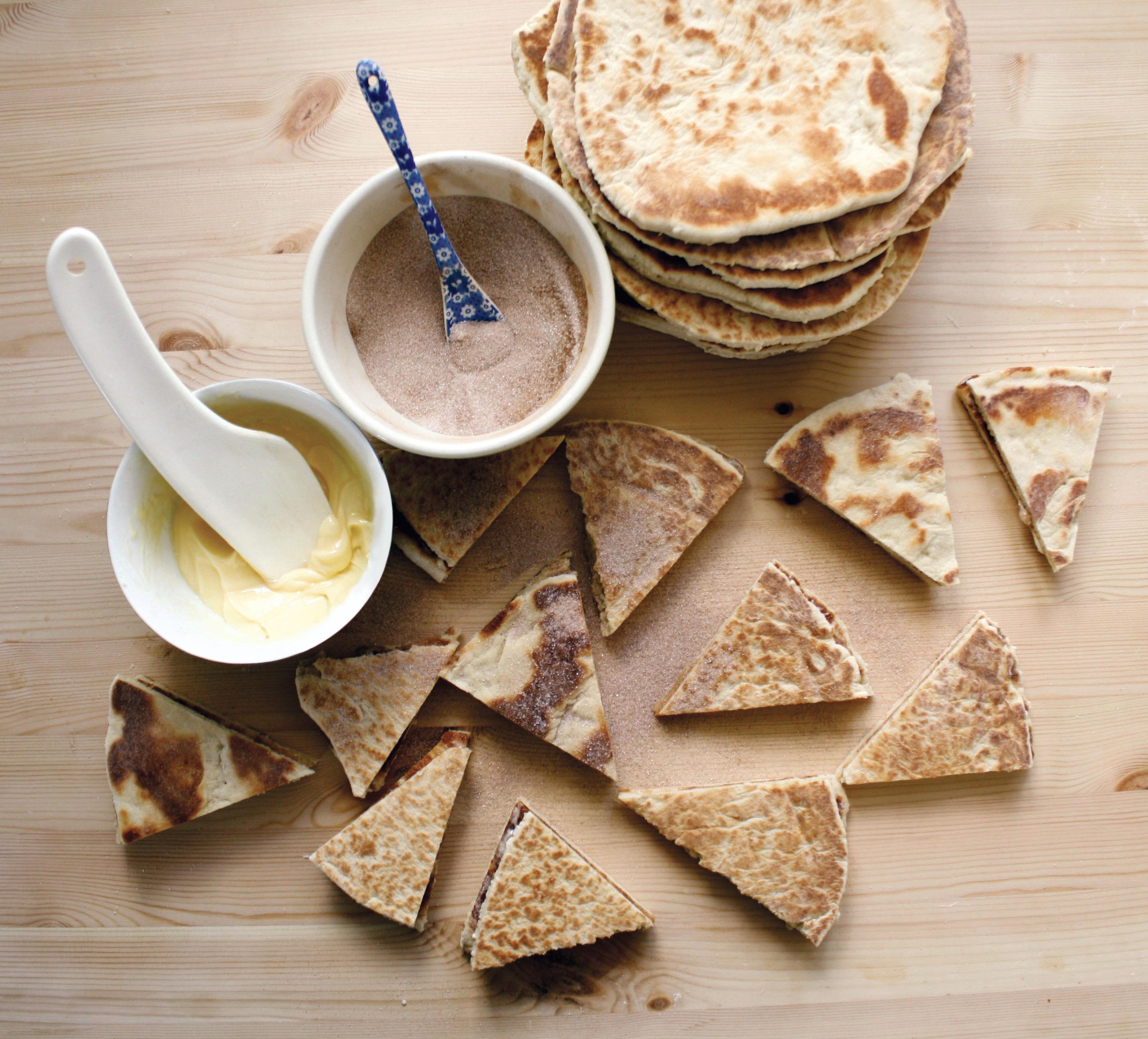 Lefse with butter, sugar and cinnamon served in Norway