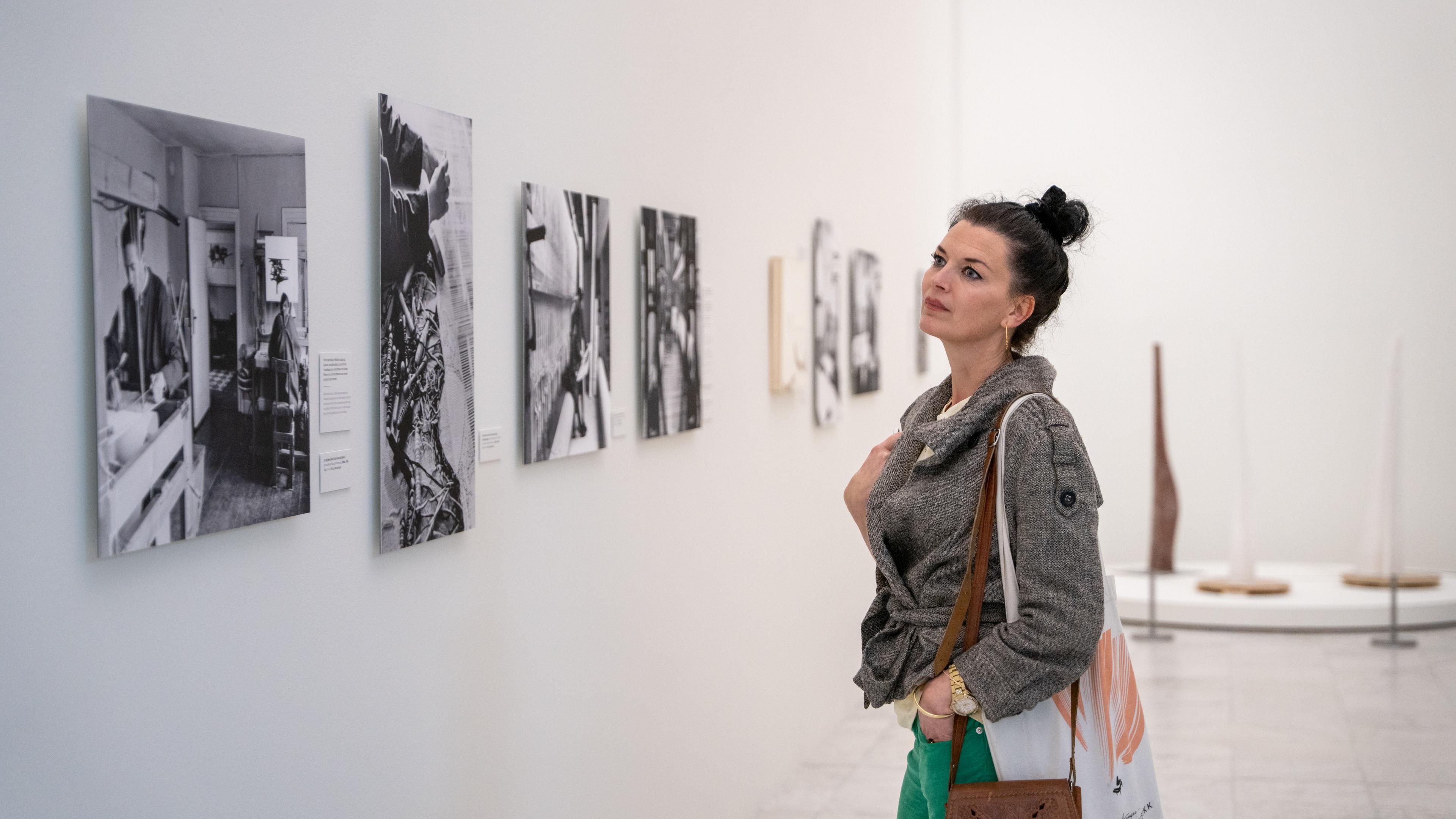 A woman looks at art at the Stavanger Kunstmuseum, Fjord Norway