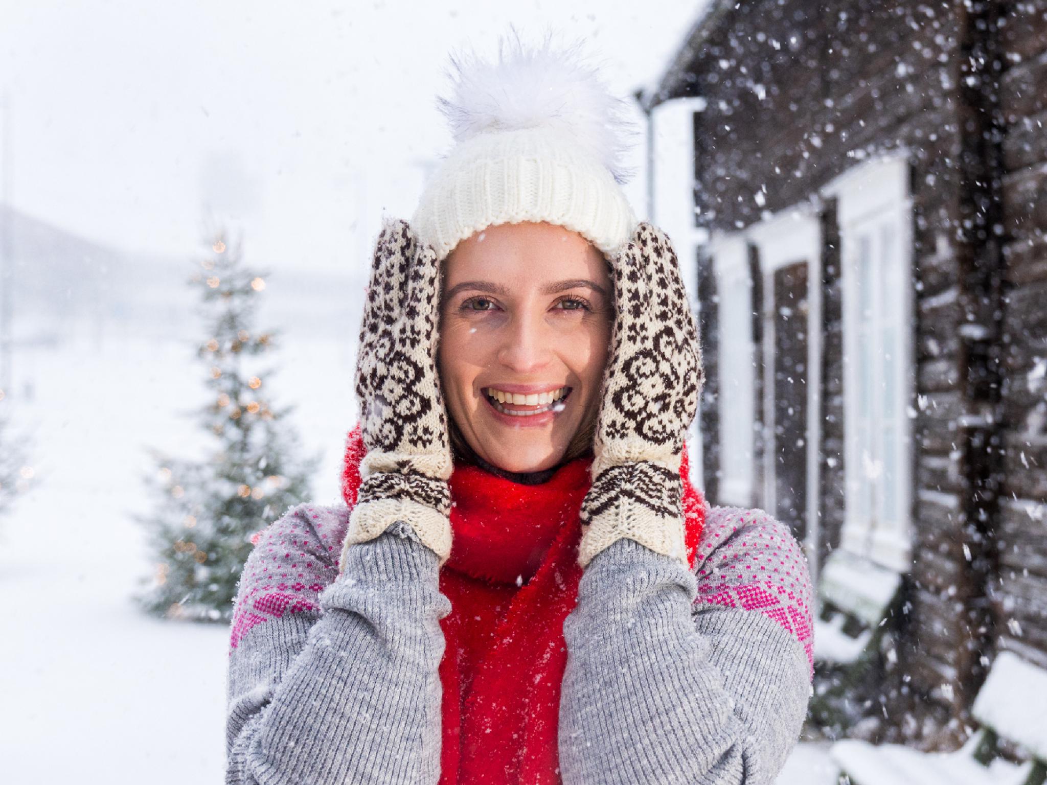 A women with Selbu mittens in Selbu in winter, Norway.