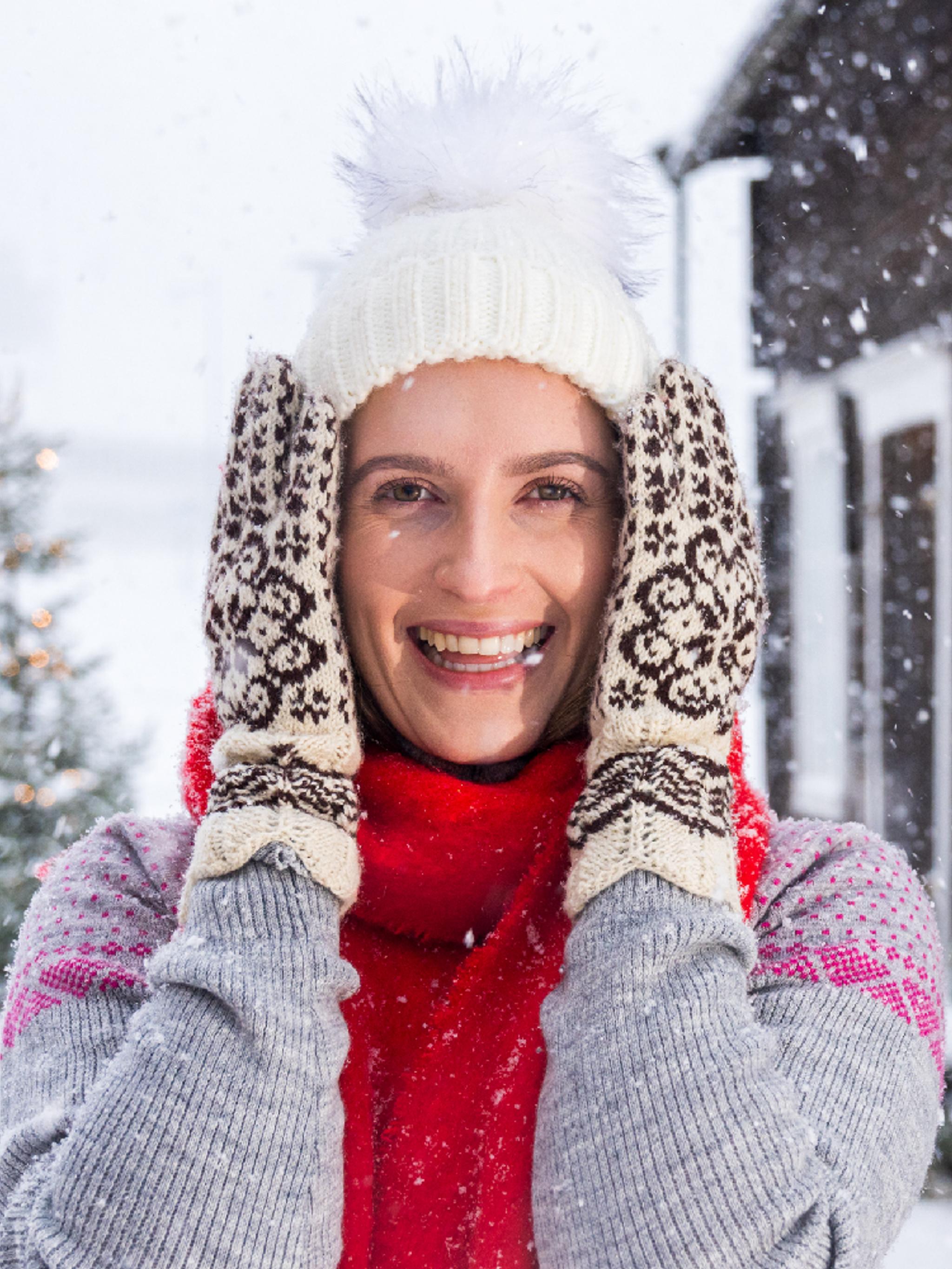 A women with Selbu mittens in Selbu in winter, Norway.
