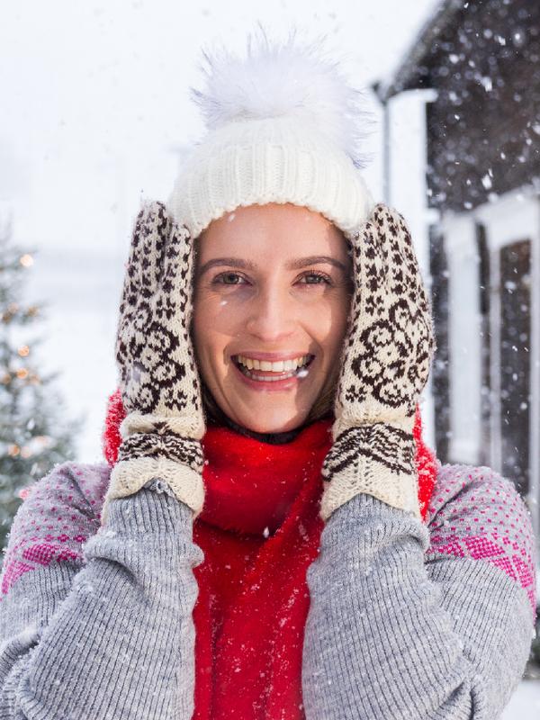 A women with Selbu mittens in Selbu in winter, Norway.