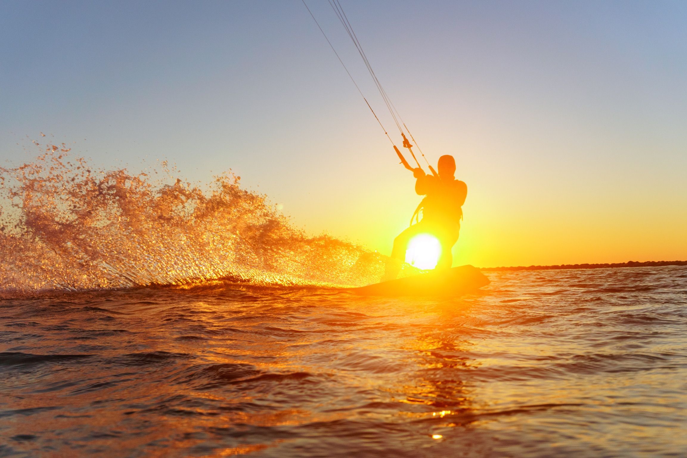 A person kiting in the sun at Jæren, Fjord Norway.
