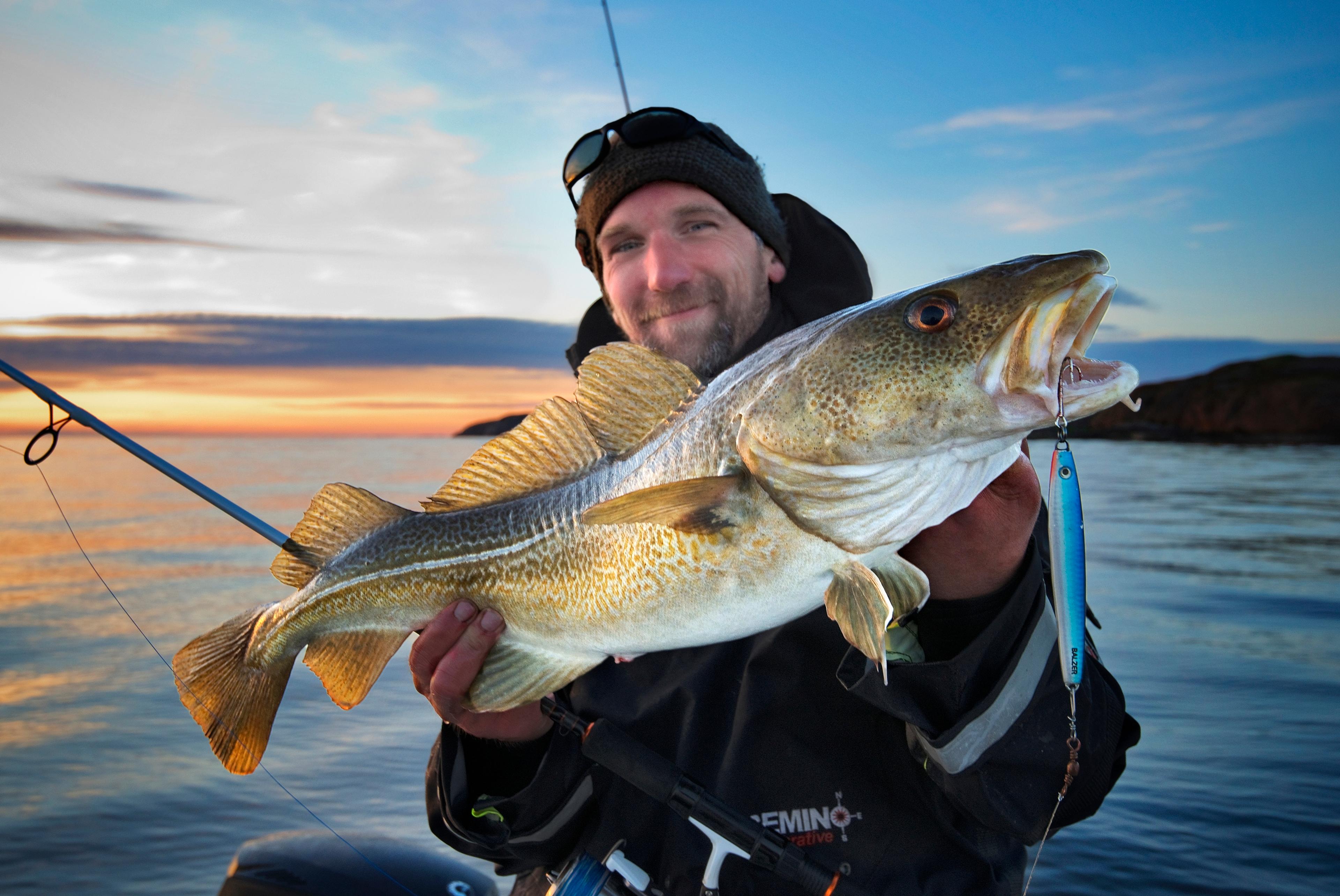 A man fishing off the coast of the Fosen peninsula in Trøndelag, Norway