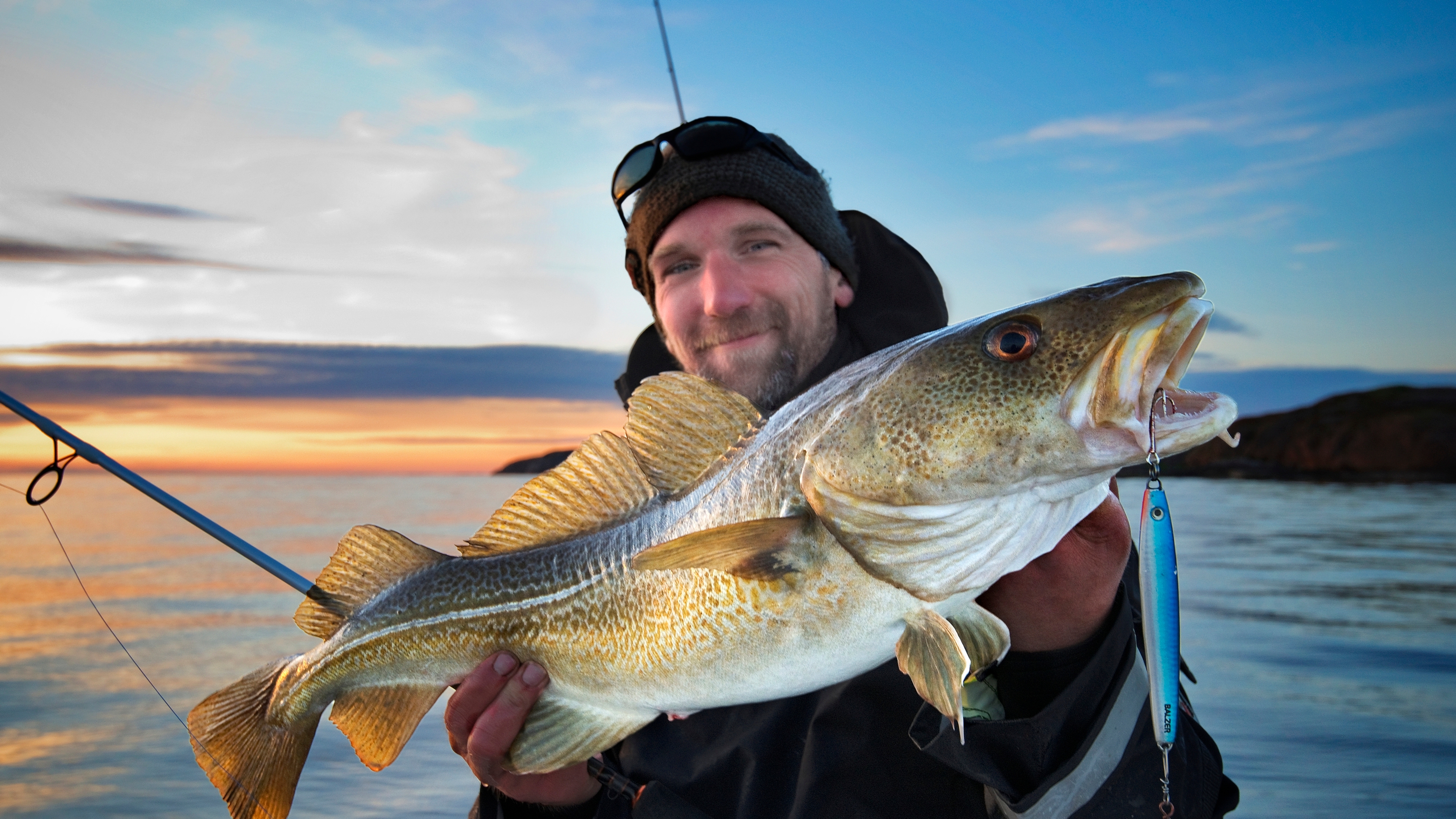 A man fishing off the coast of the Fosen peninsula in Trøndelag, Norway