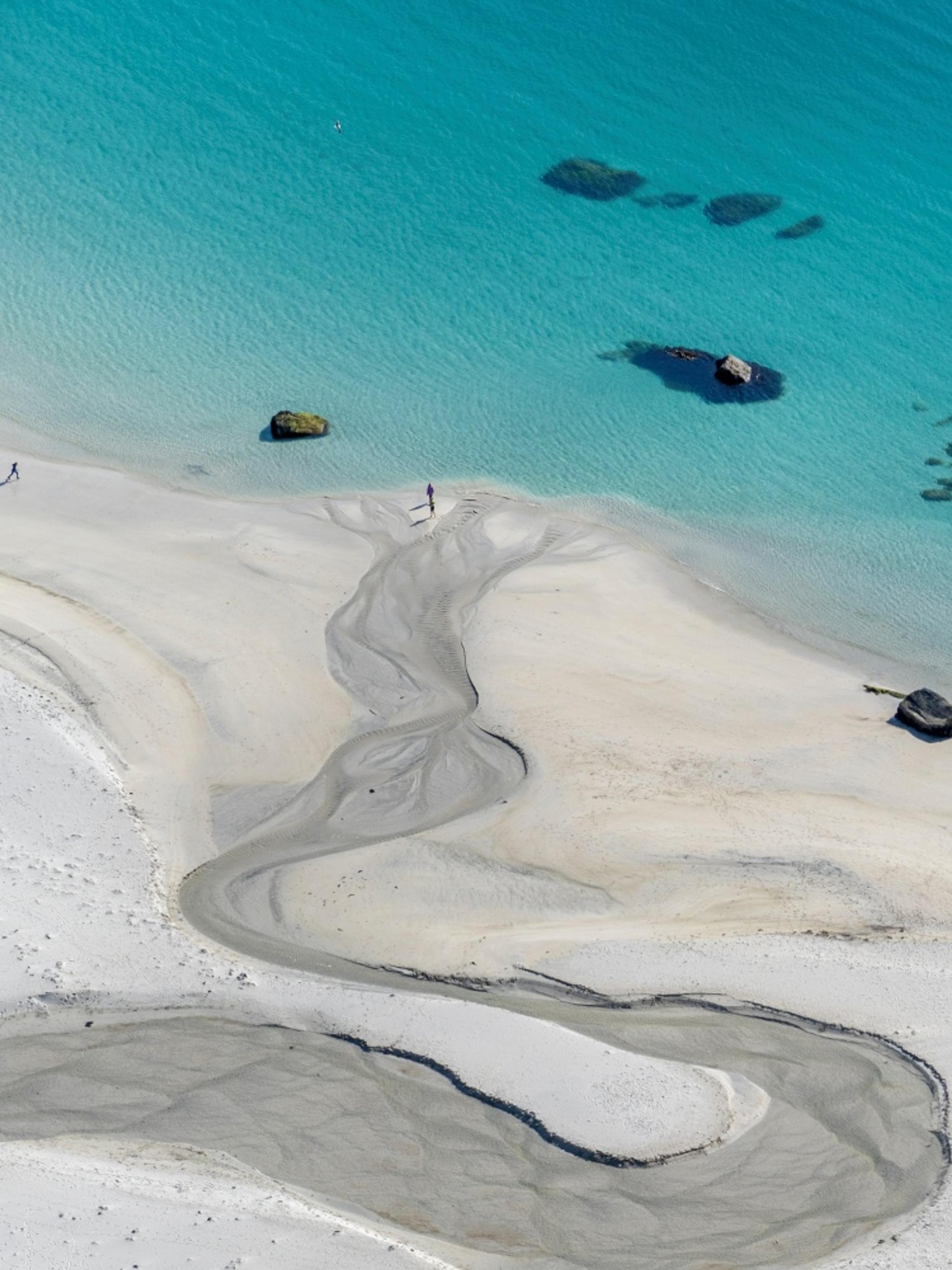 The turquoise water of the Hauklandstranda beach in Lofoten in Northern Norway