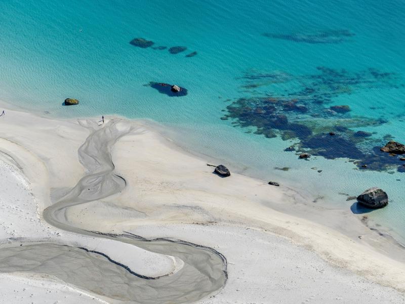 The turquoise water of the Hauklandstranda beach in Lofoten in Northern Norway
