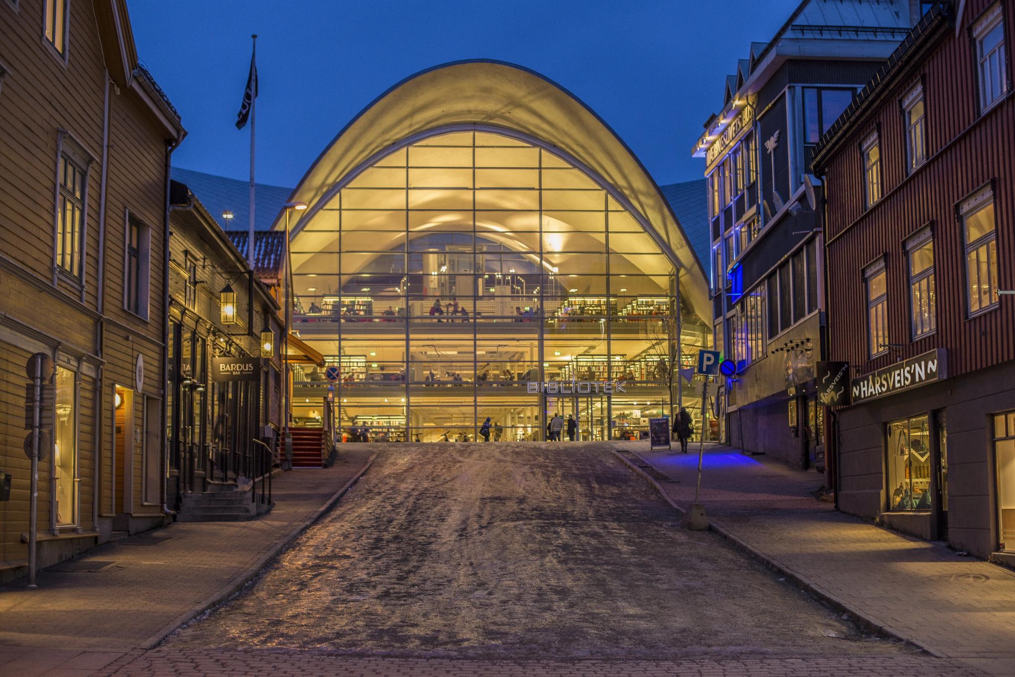 View from the outside of the city library and archive Tromsø bibliotek og byarkiv in the dark, Tromsø, Northern Norway