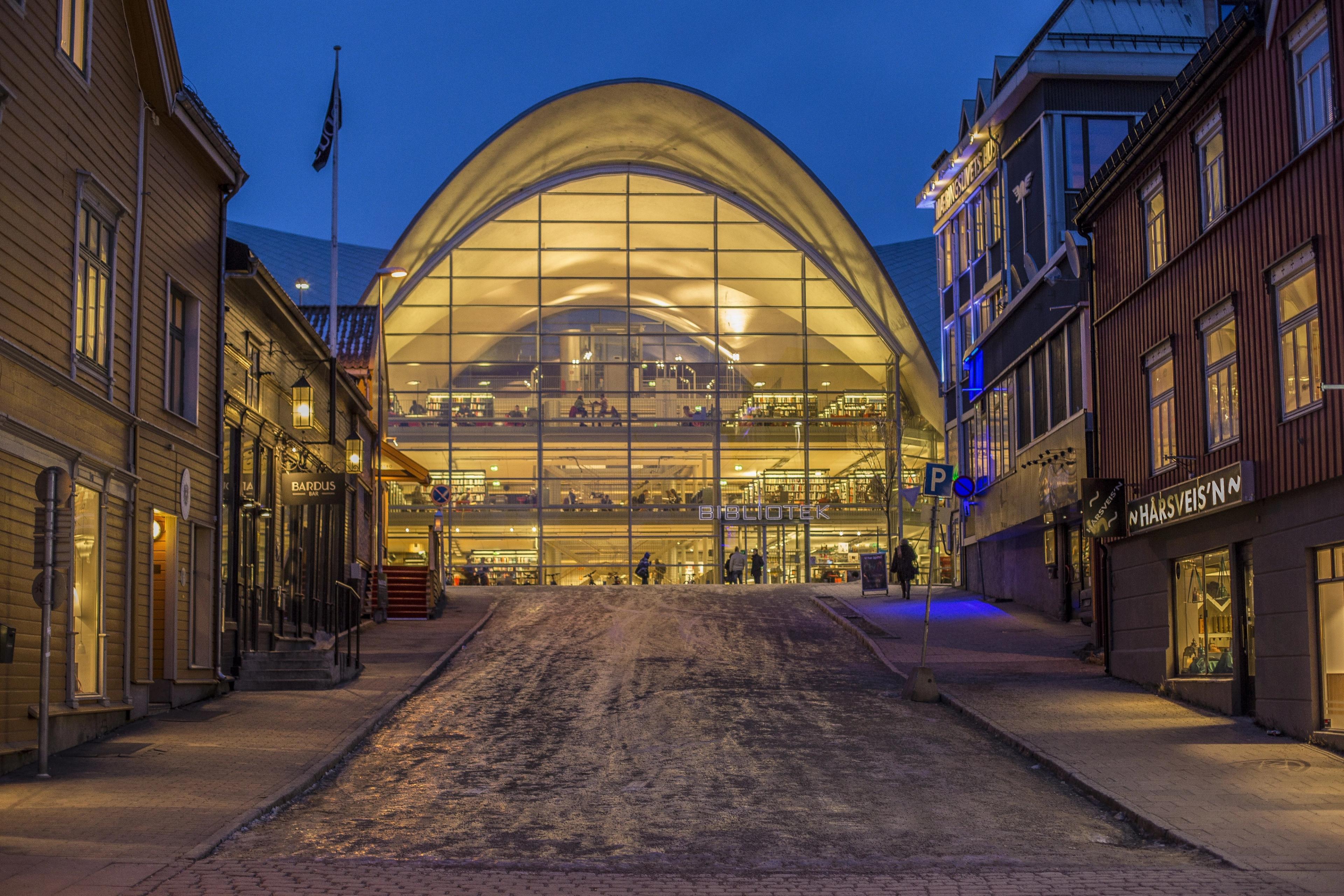 View from the outside of the city library and archive Tromsø bibliotek og byarkiv in the dark, Tromsø, Northern Norway