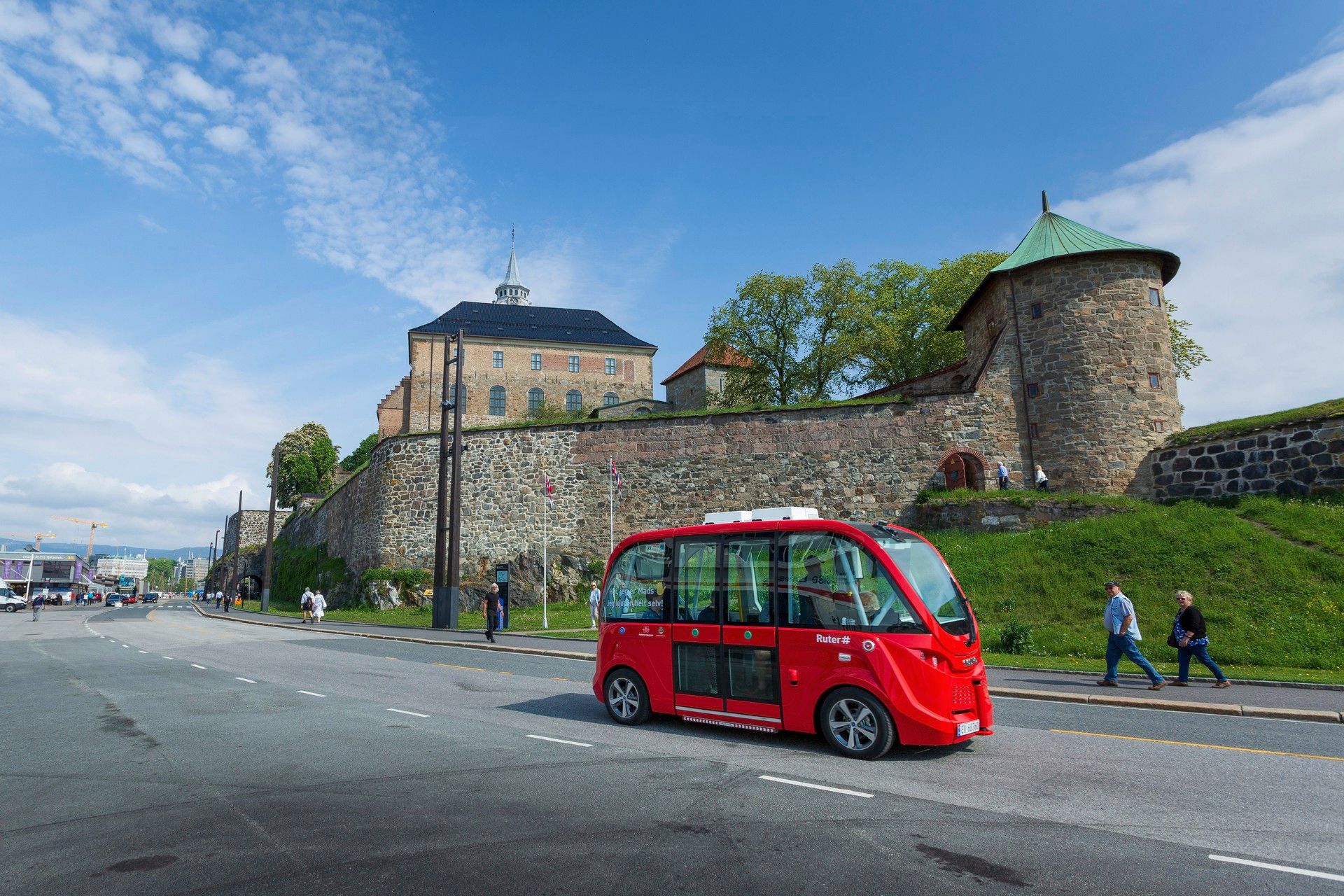 Electric bus from Ruter in front of the Akershus fortress in Oslo, Norway