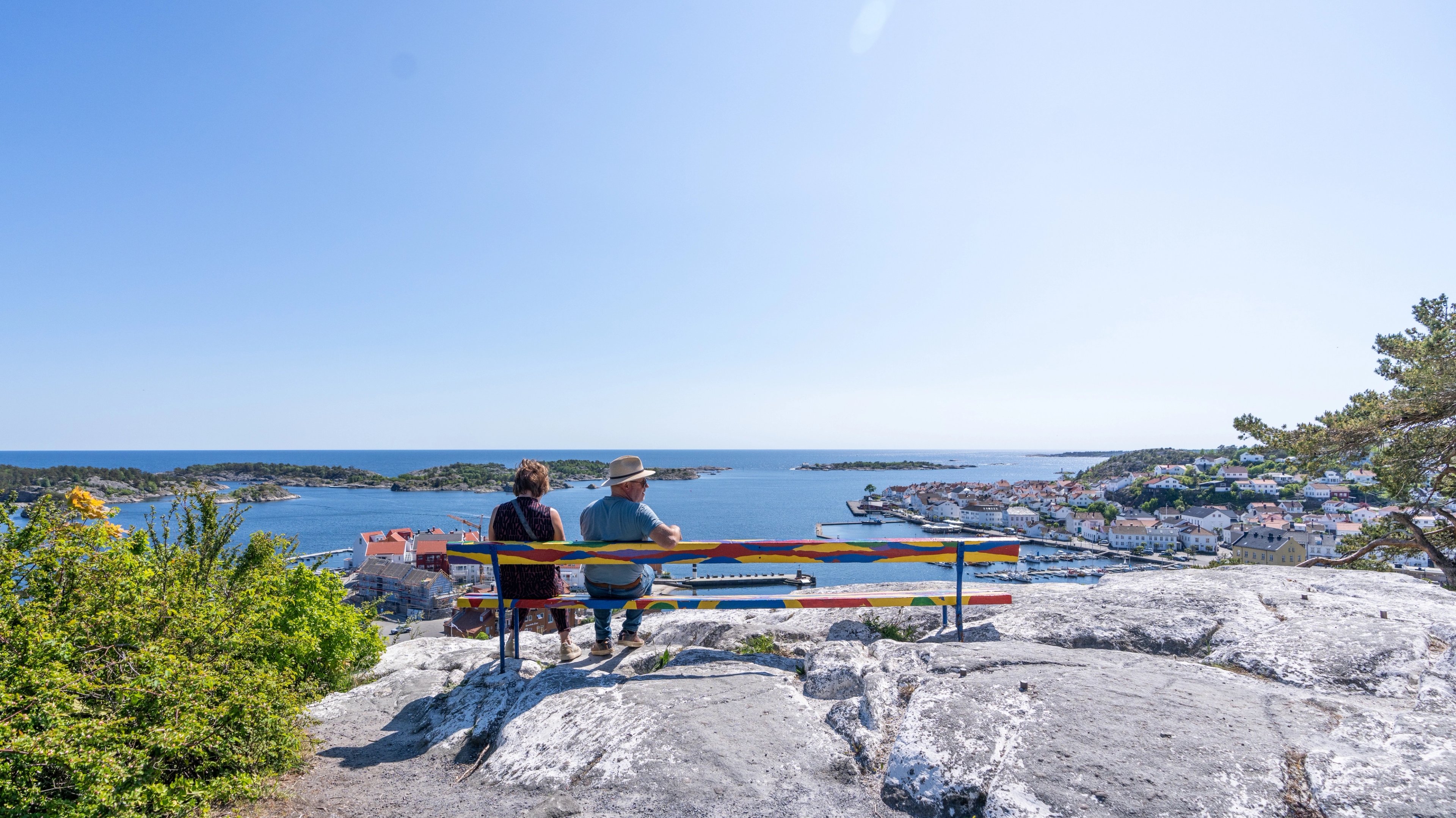 Two people enjoying the view at The White Spot in Risør