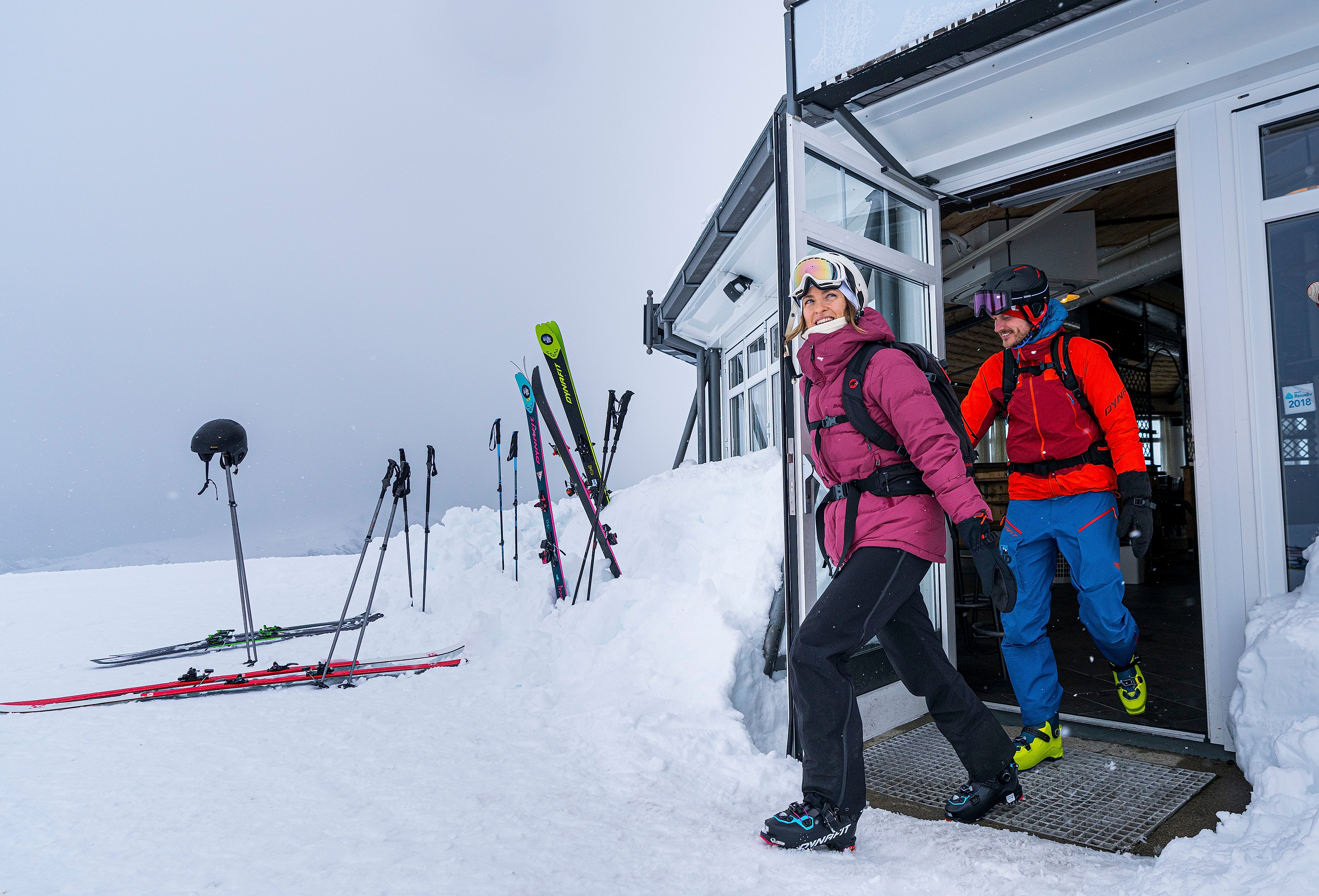 Two people at the Fjord Panorama restaurant on top of Stranda Ski Resort